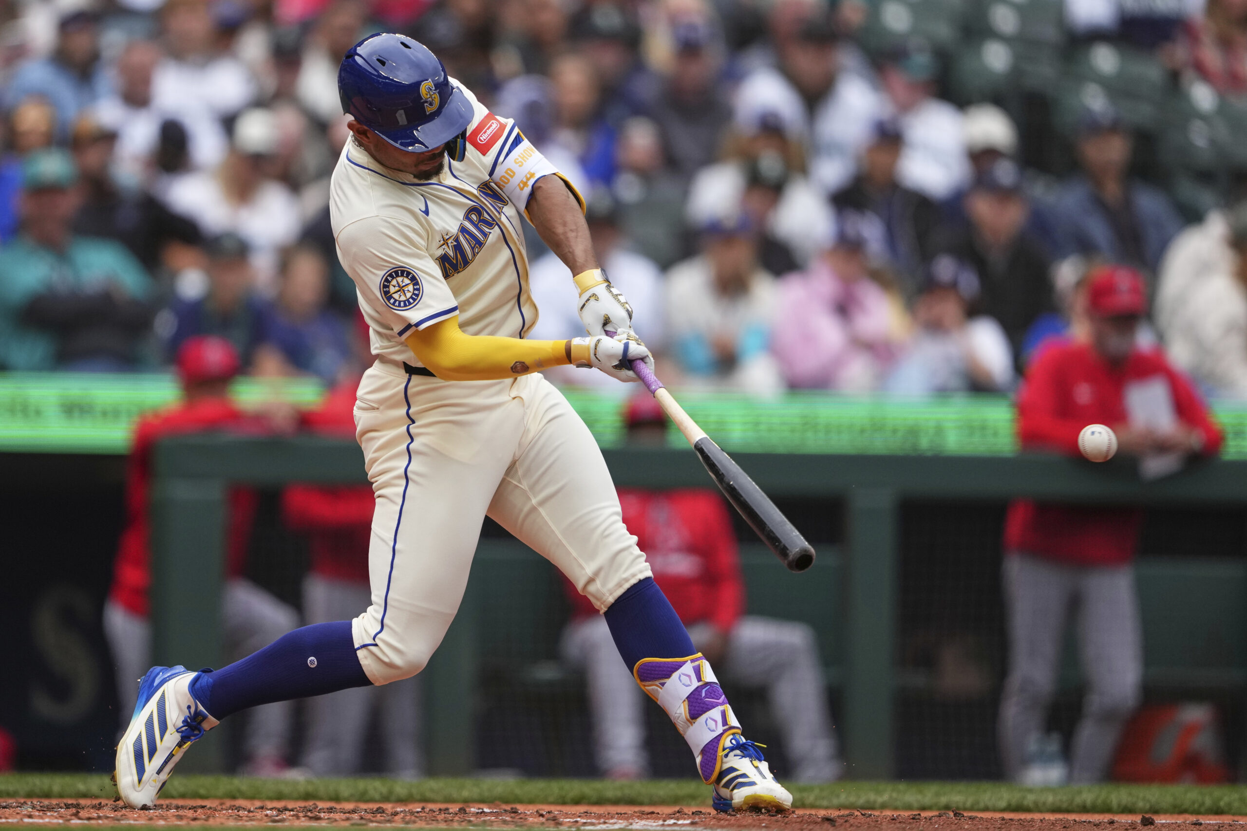 Seattle Mariners’ Julio Rodriguez hits an RBI double against the...