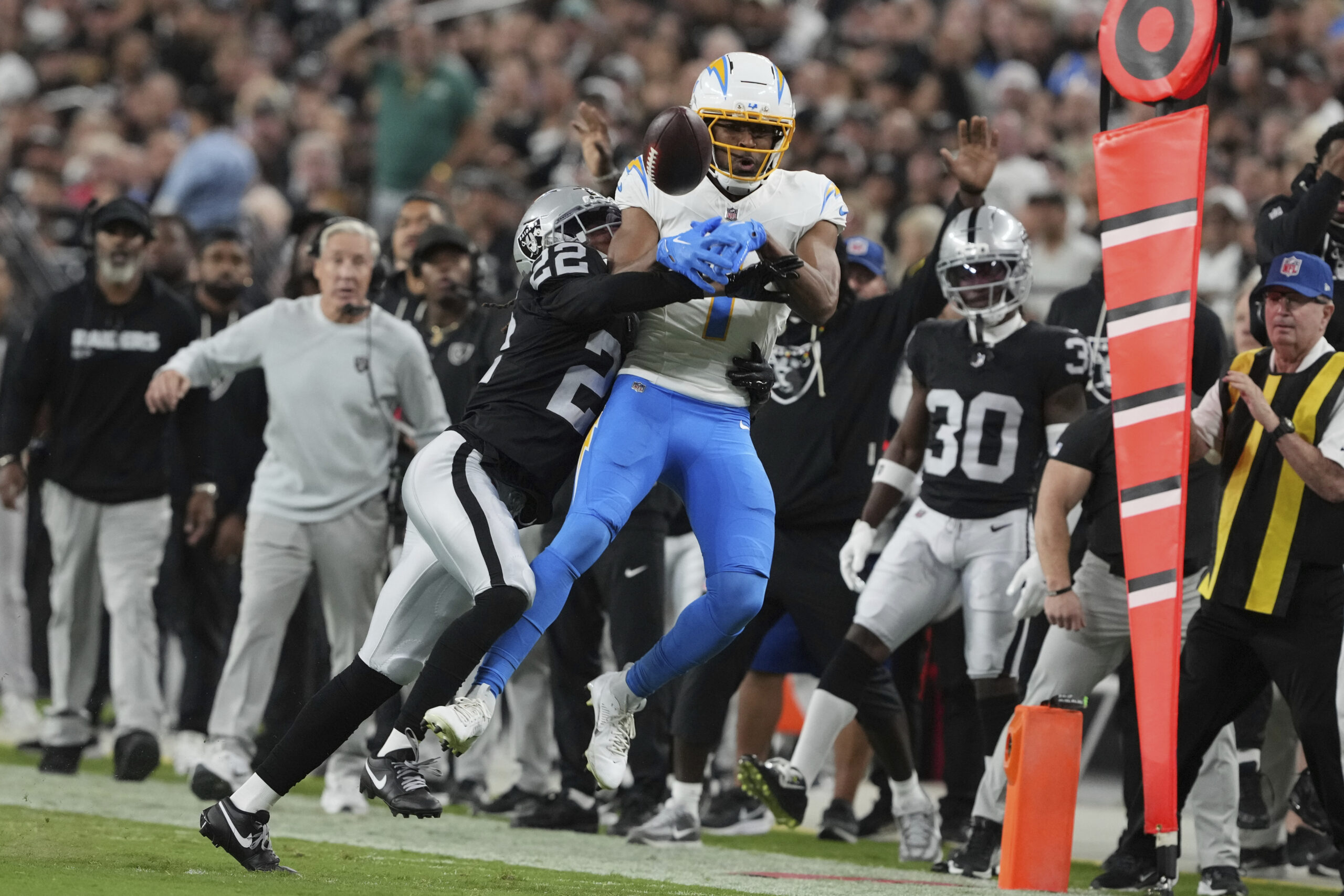 Las Vegas Raiders cornerback Eric Stokes (22) breaks up a...