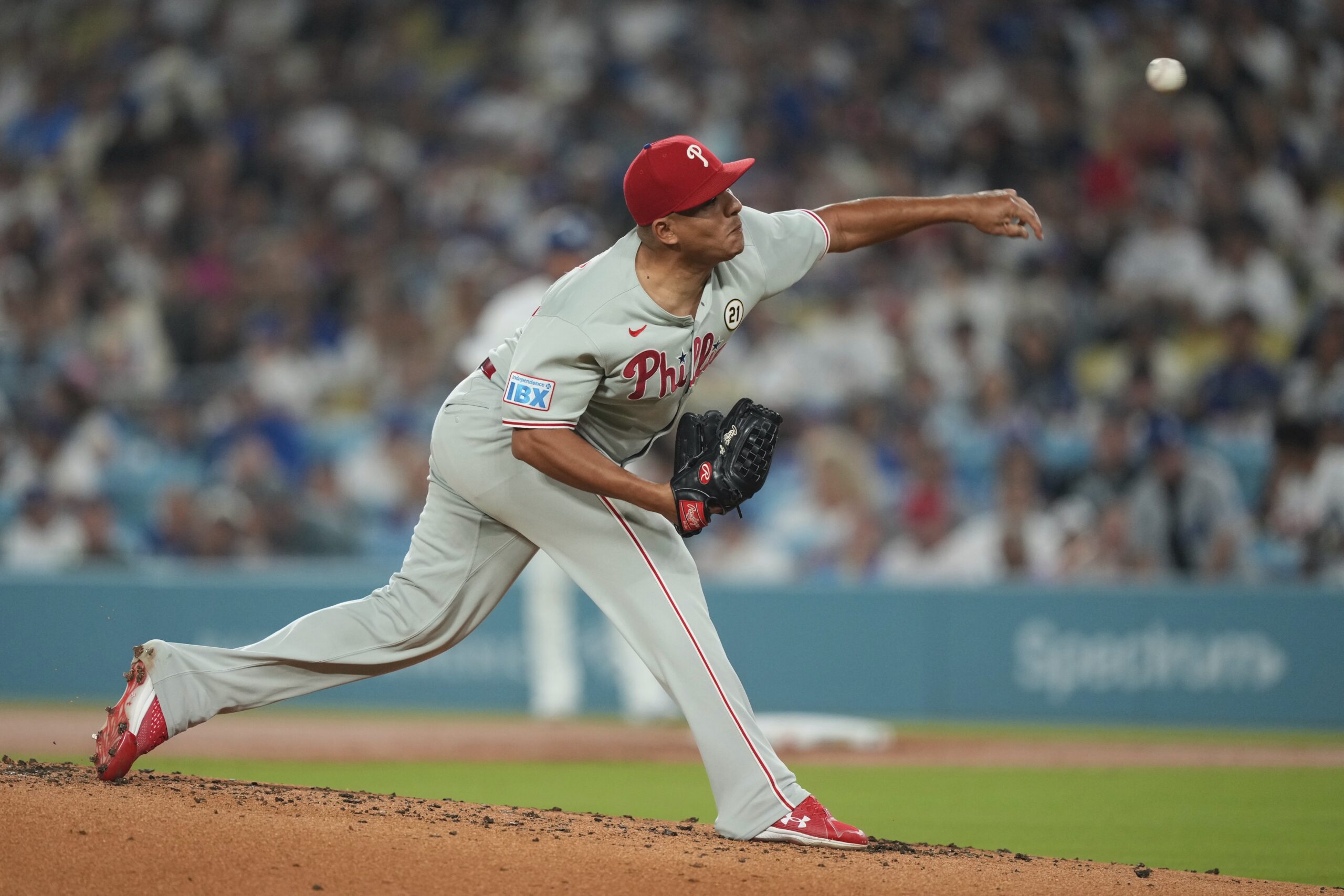 Philadelphia Phillies starting pitcher Ranger Suarez throws to the plate...