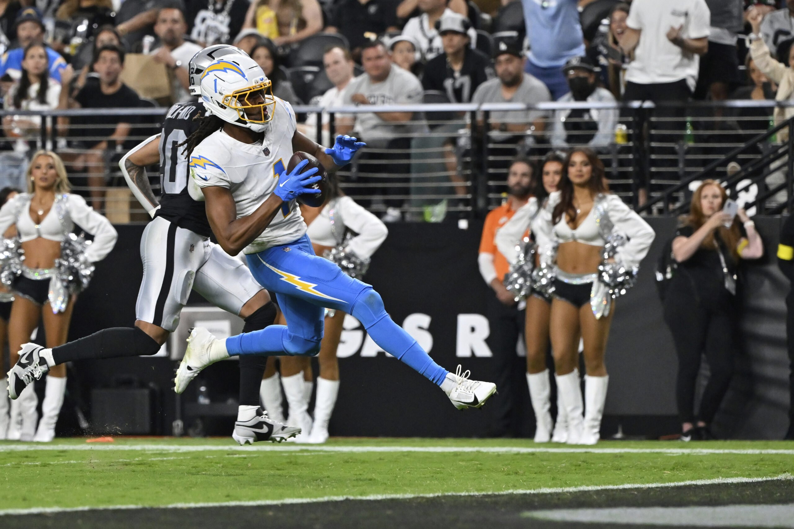 Chargers wide receiver Quentin Johnston scores a touchdown against the...