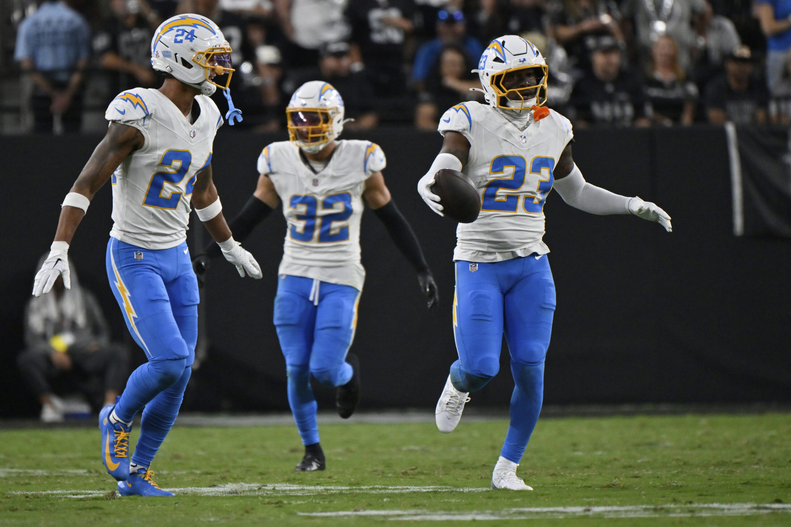 Chargers safety Tony Jefferson (23) celebrates after making an interception...