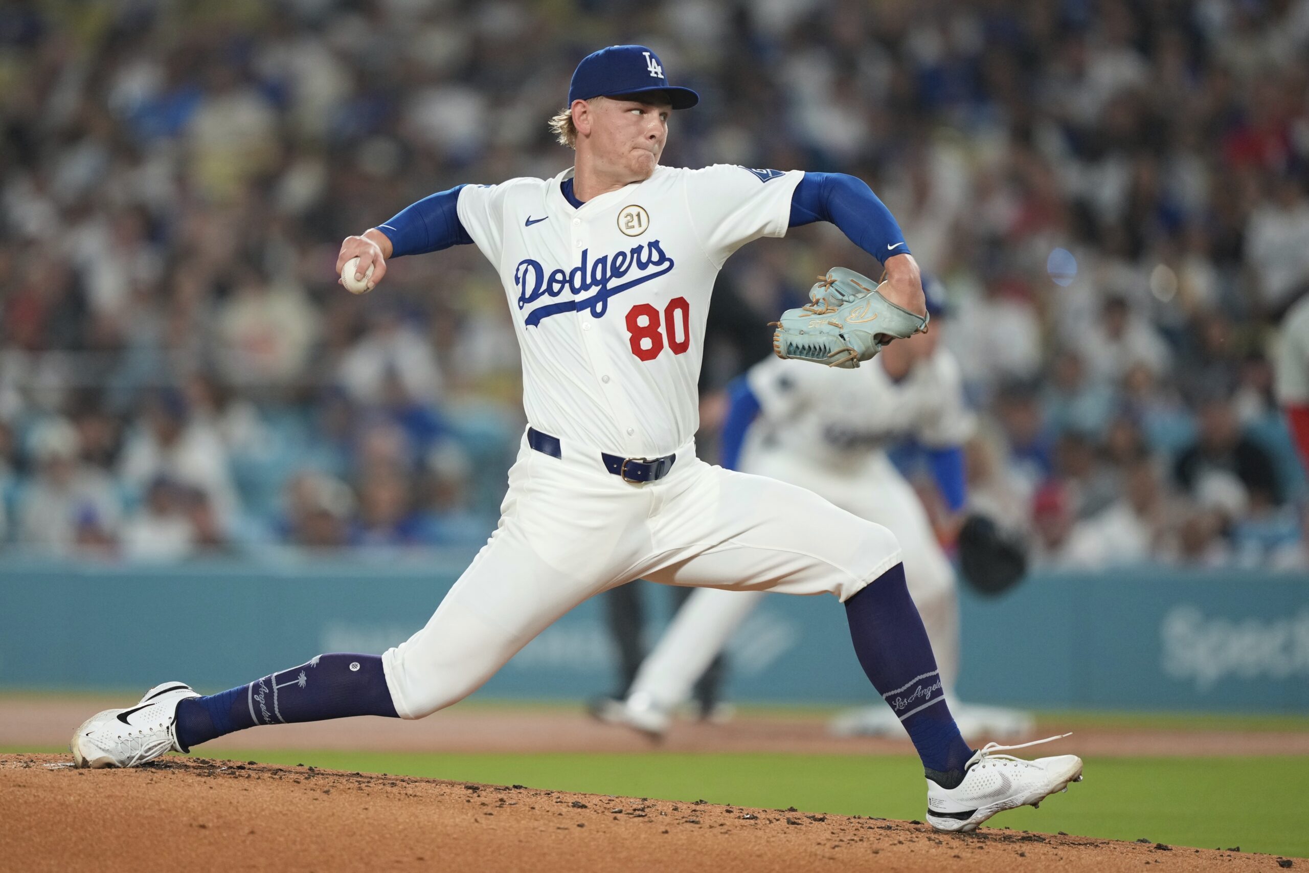 Dodgers pitcher Emmet Sheehan throws to the plate during the...