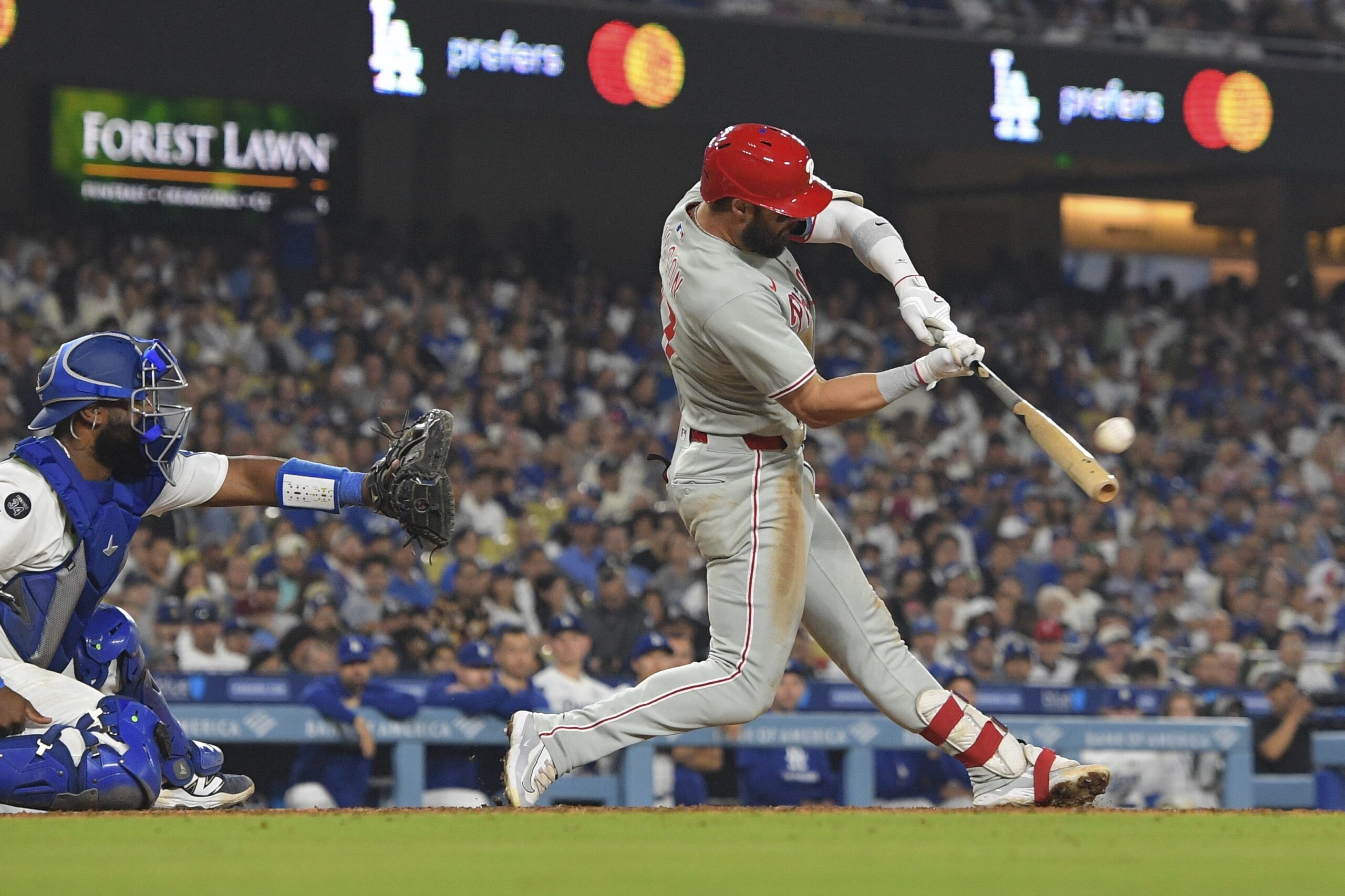 The Philadelphia Phillies’ Weston Wilson hits a two-run home run...