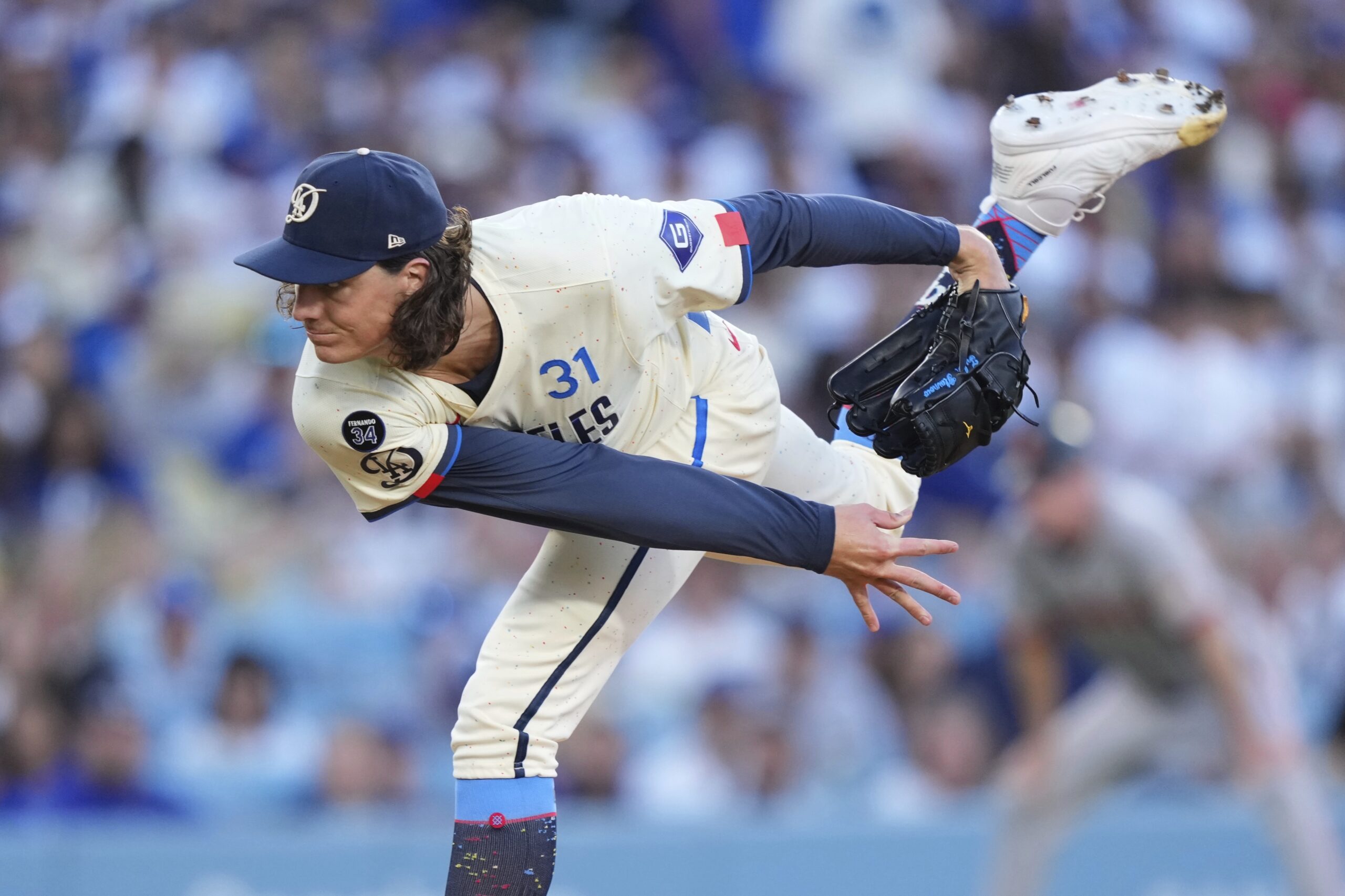 Dodgers starting pitcher Tyler Glasnow throws to the plate during...