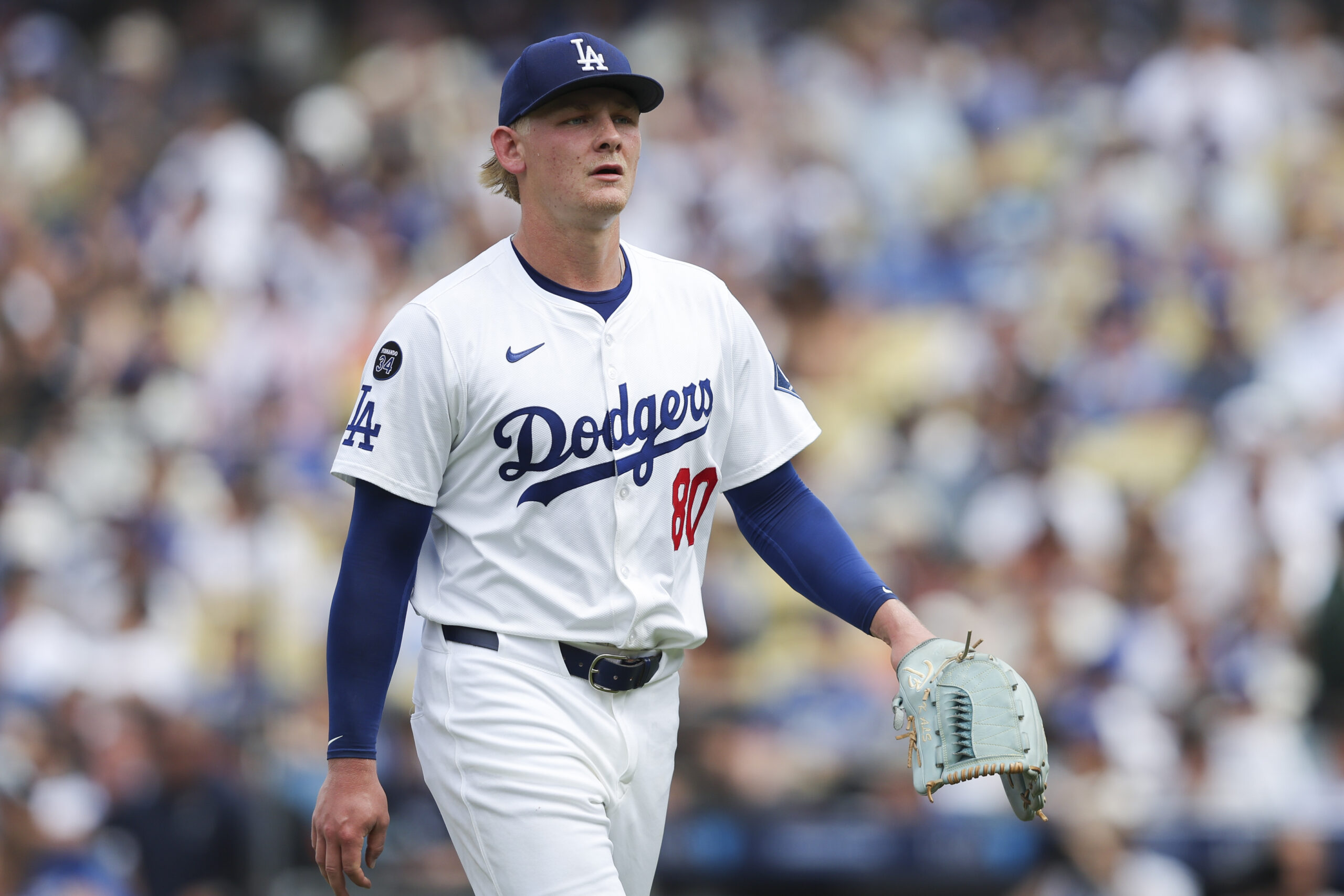 Los Angeles Dodgers pitcher Emmet Sheehan walks towards the dugout...