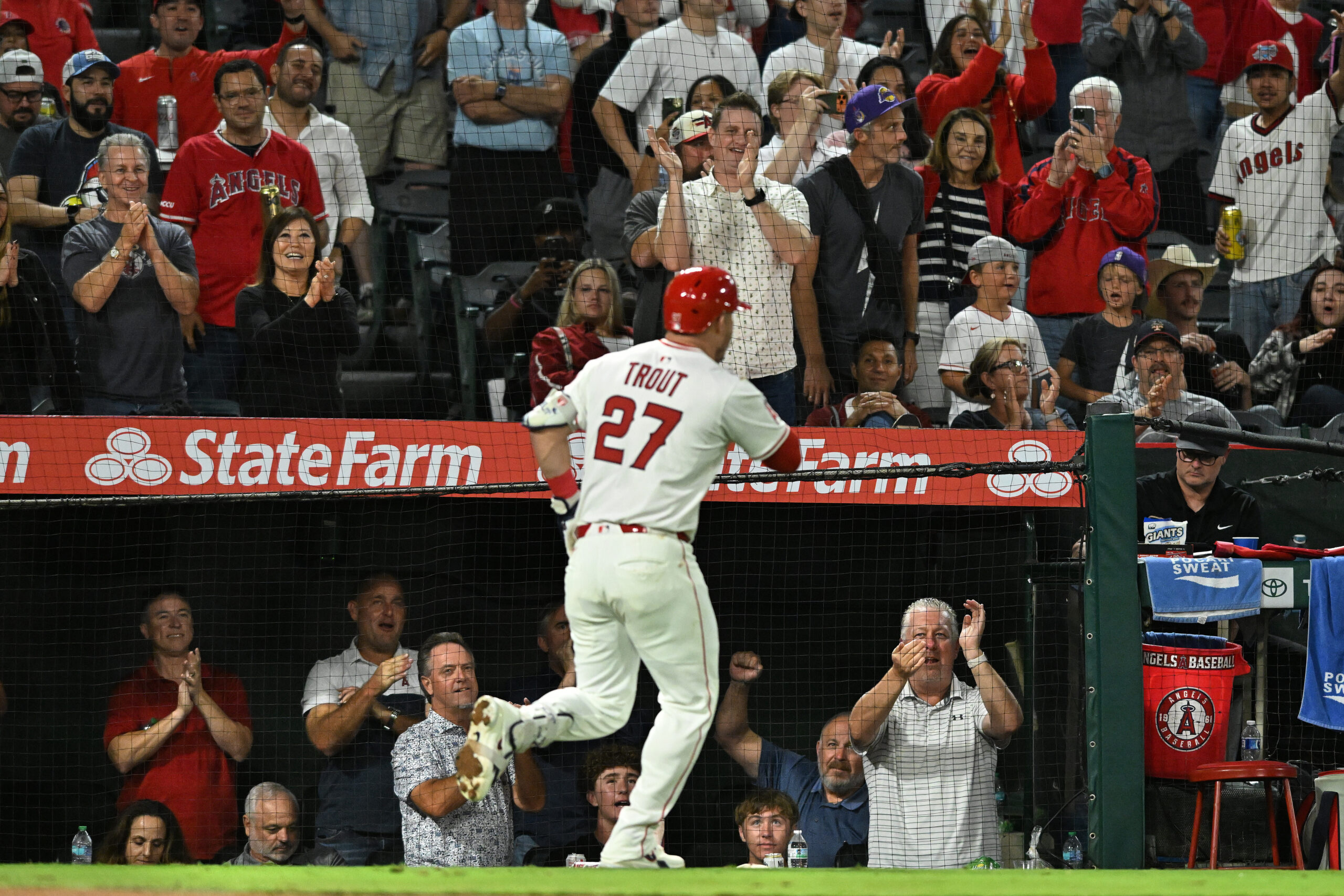 Angels star Mike Trout (27) celebrates after hitting a two-run...