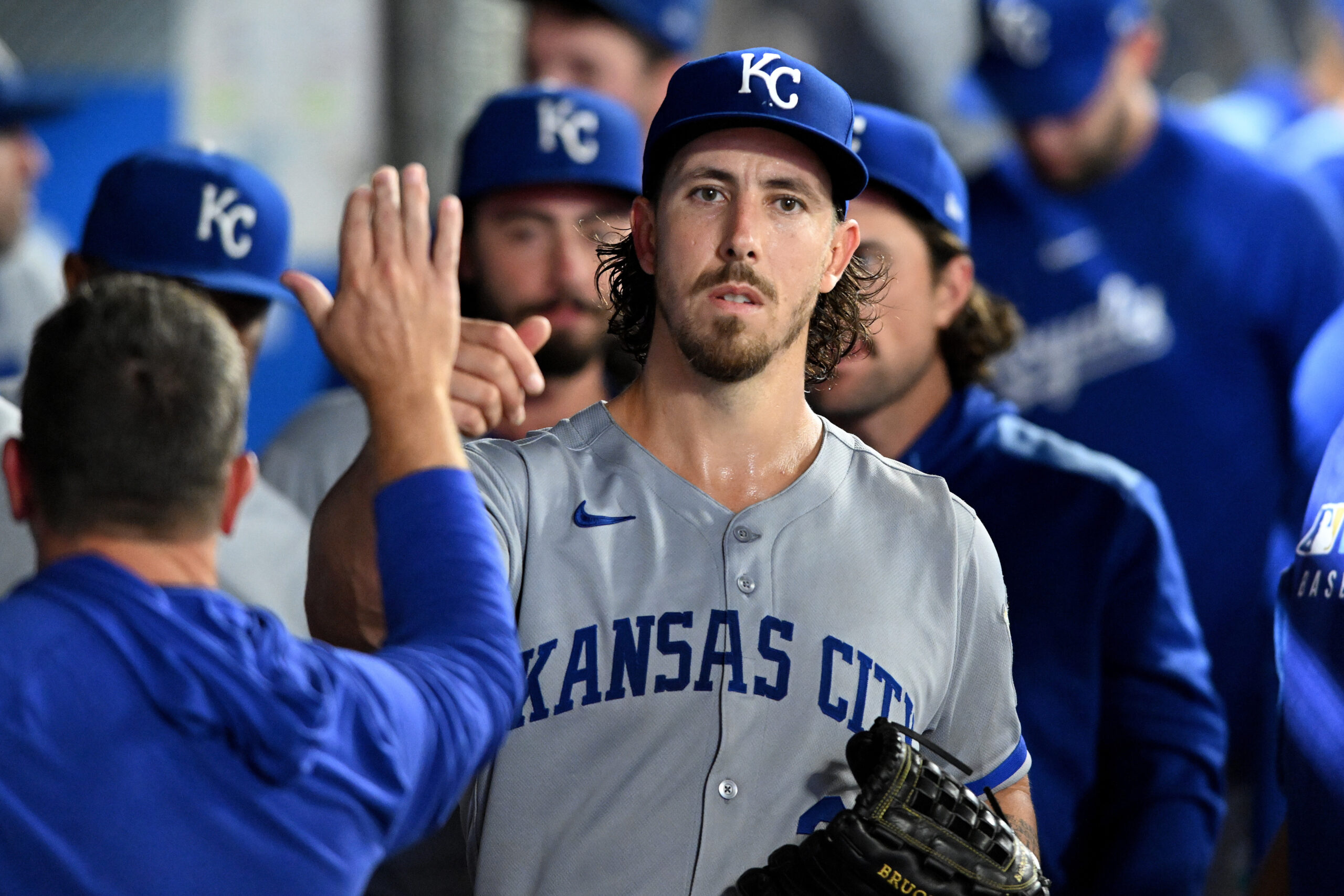 Kansas City Royals starting pitcher Michael Lorenzen walks through the...