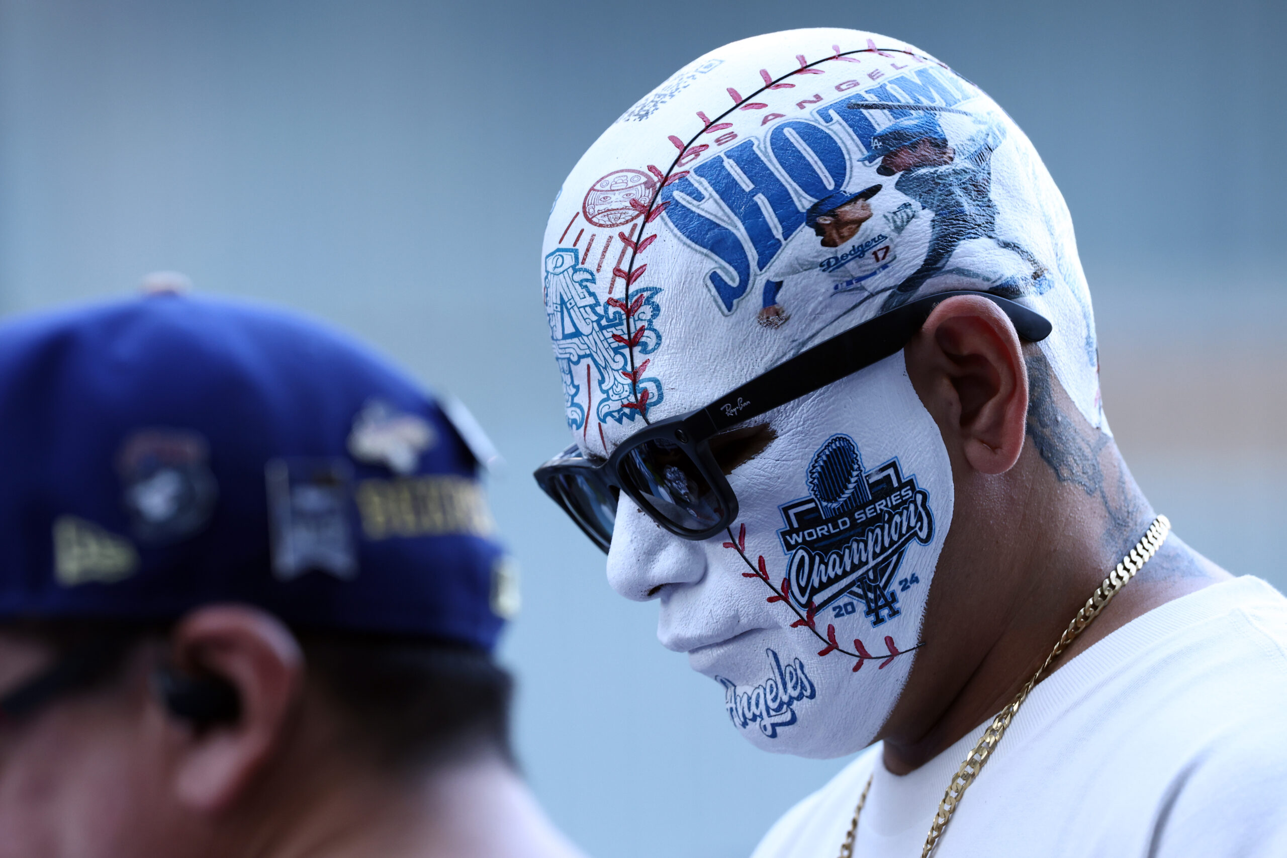 Painted images of Dodgers star Shohei Ohtani are seen on...