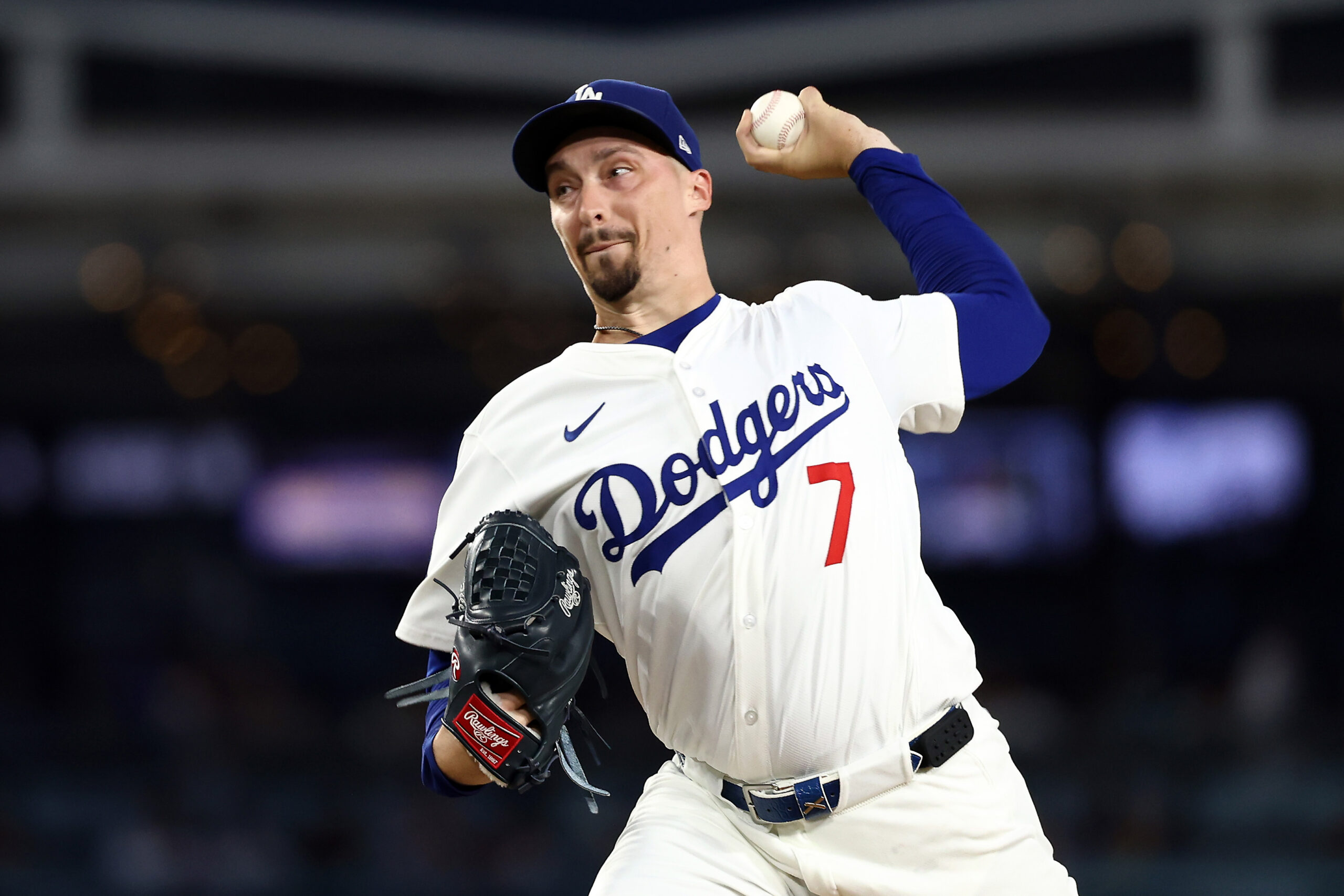 Dodgers starting pitcher Blake Snell throws to the plate during...