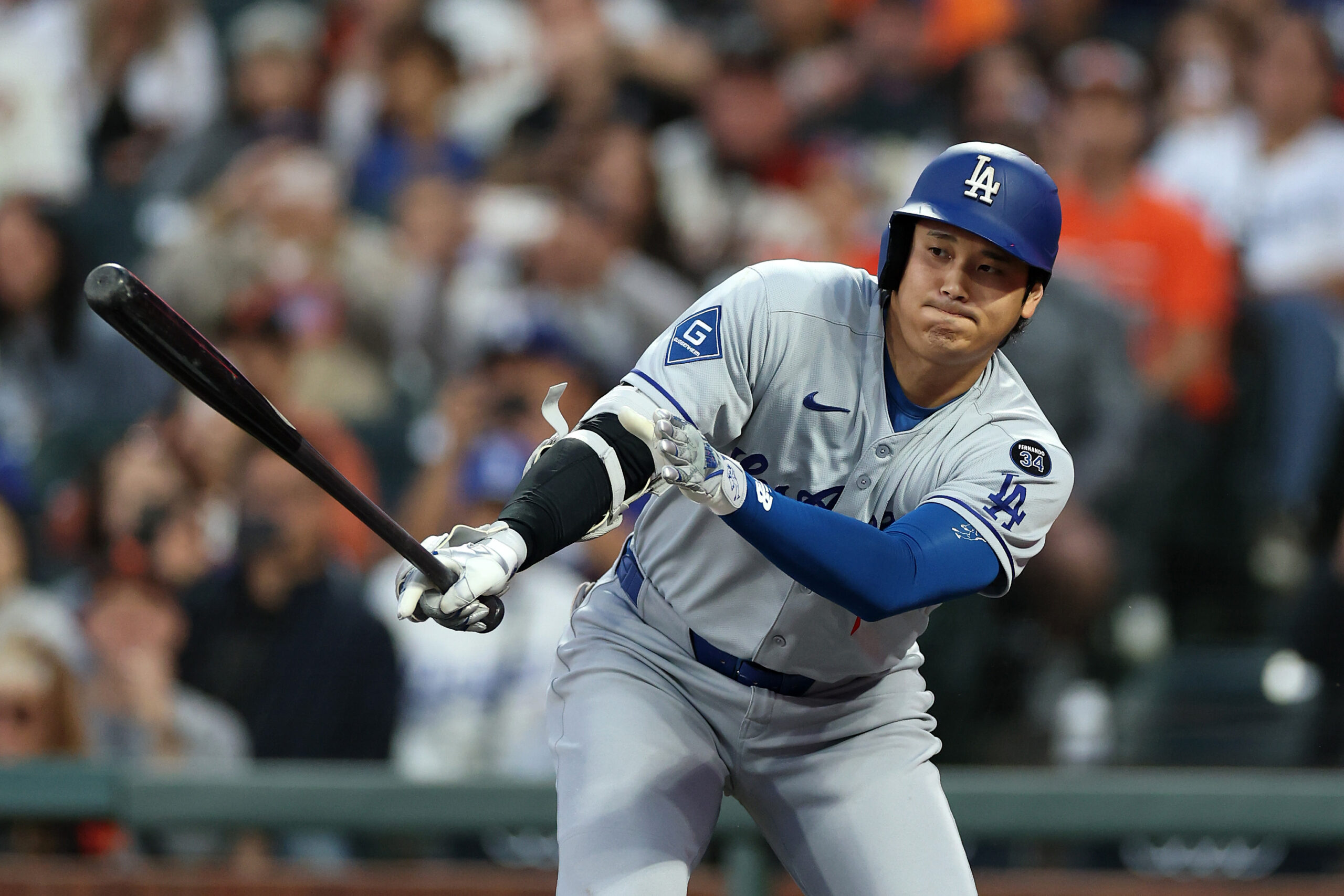 Dodgers star Shohei Ohtani grounds out during the first inning...