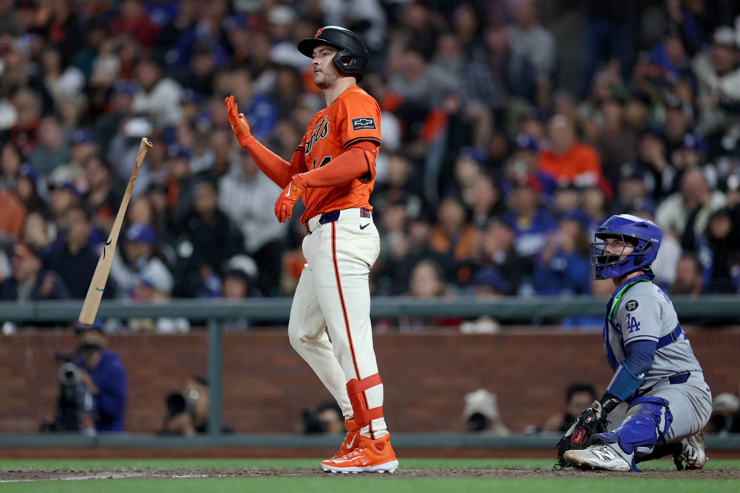 The San Francisco Giants’ Patrick Bailey tosses his bat as...