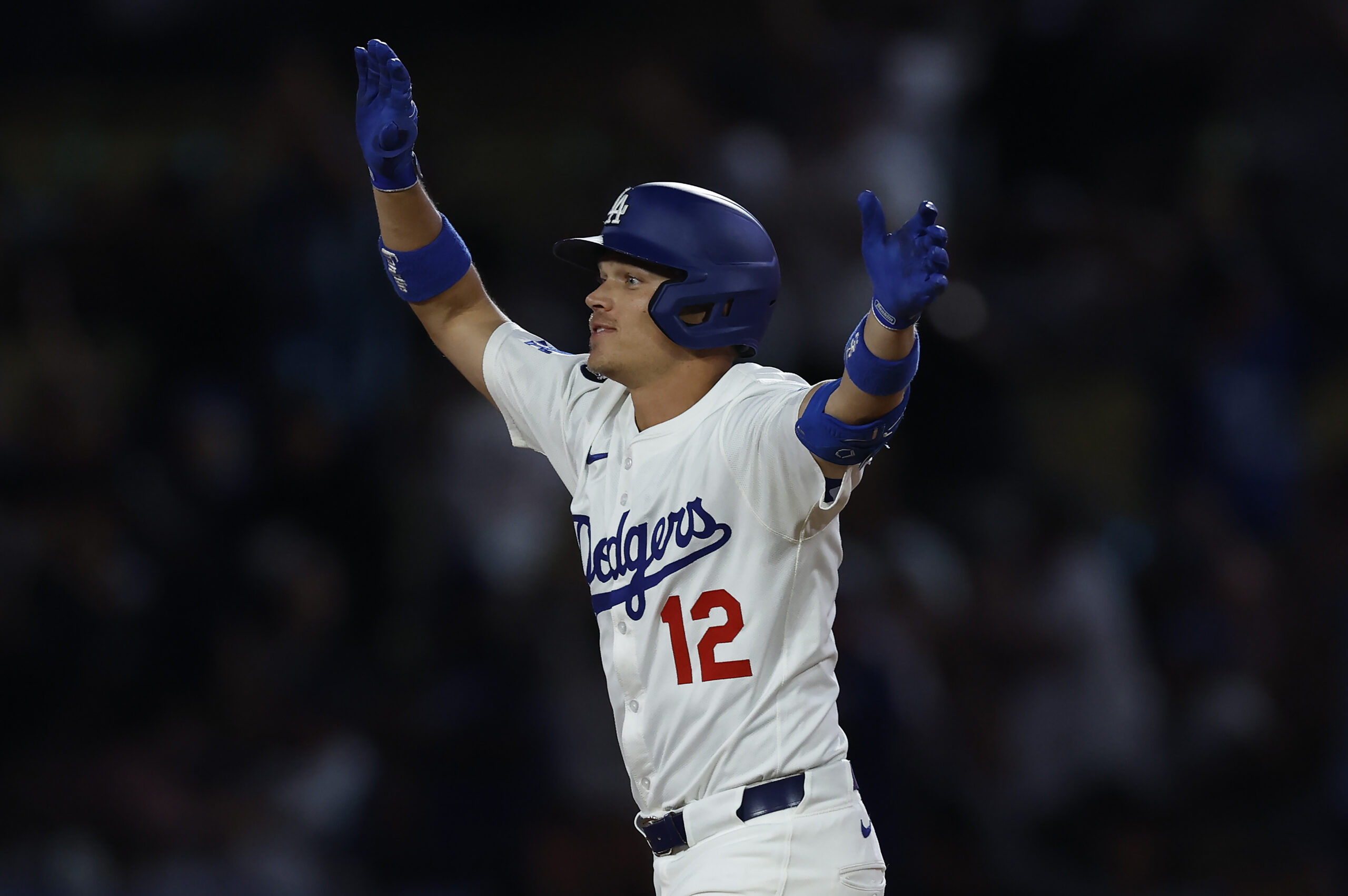 The Dodgers’ Alex Call celebrates as he runs the bases...