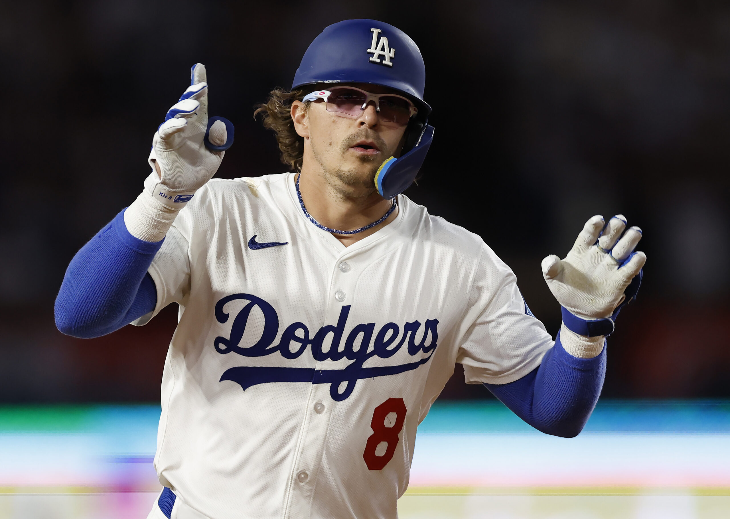 The Dodgers’ Kiké Hernandez celebrates as he runs the bases...