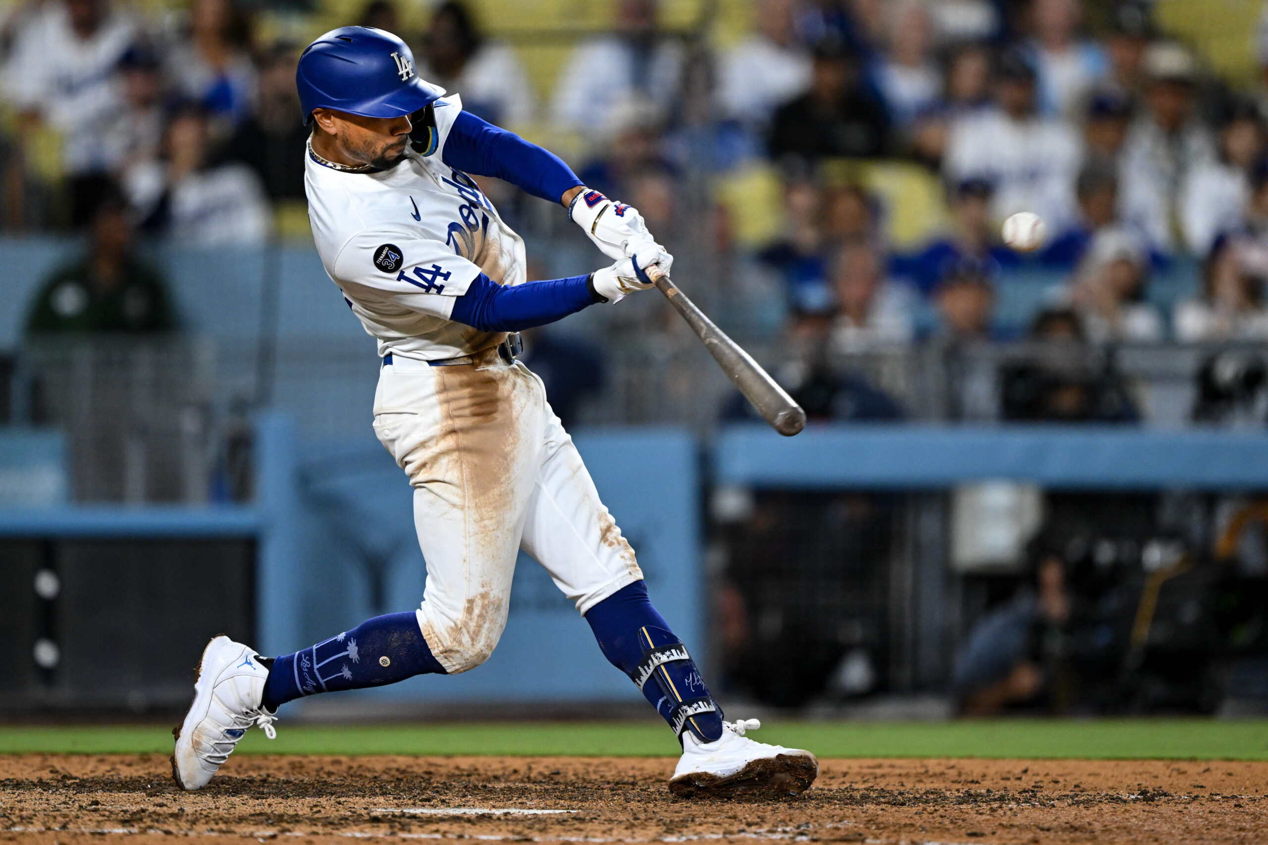 The Dodgers’ Mookie Betts connects for a grand slam during...