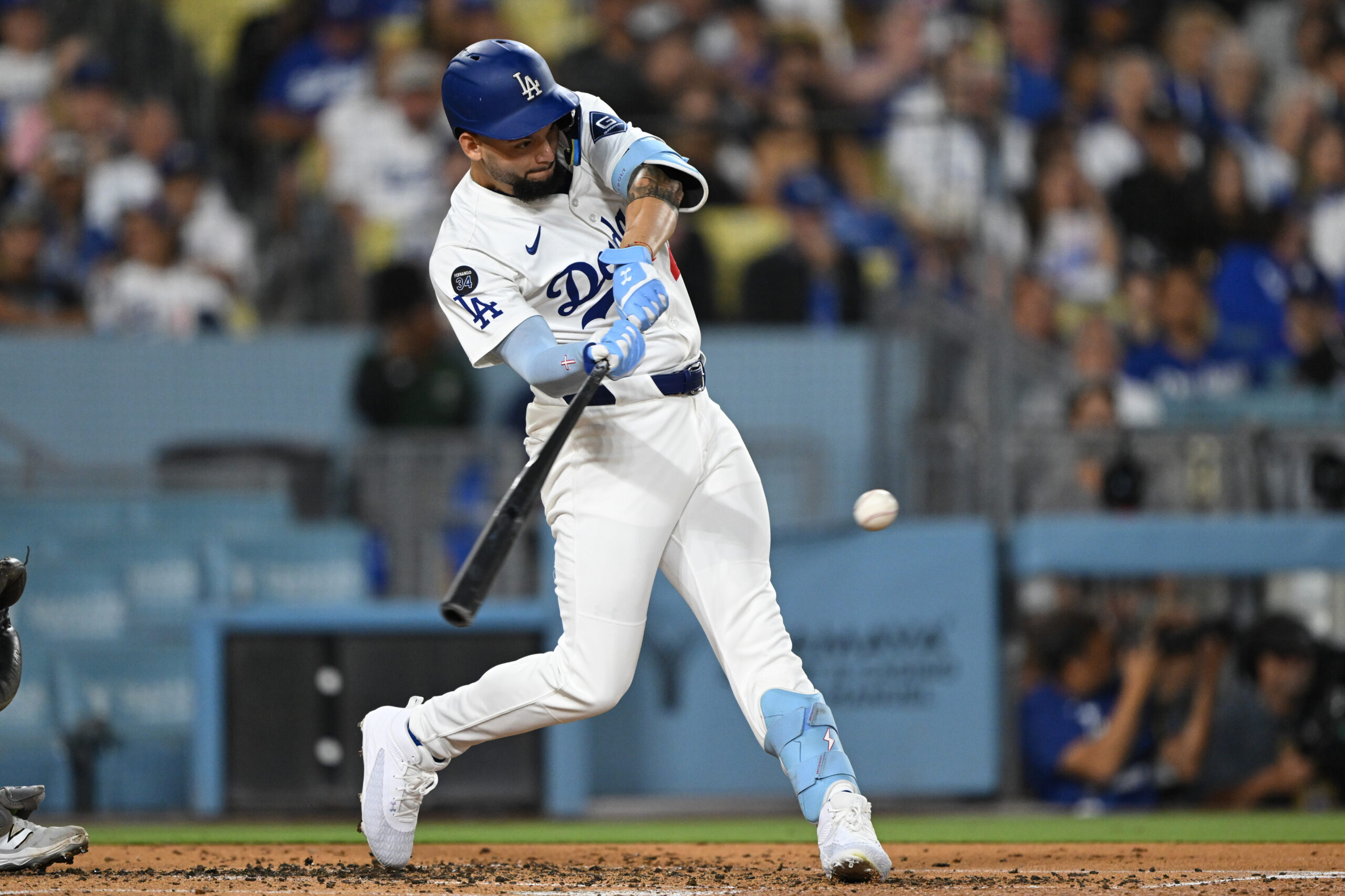 The Dodgers’ Andy Pages connects for a double during the...