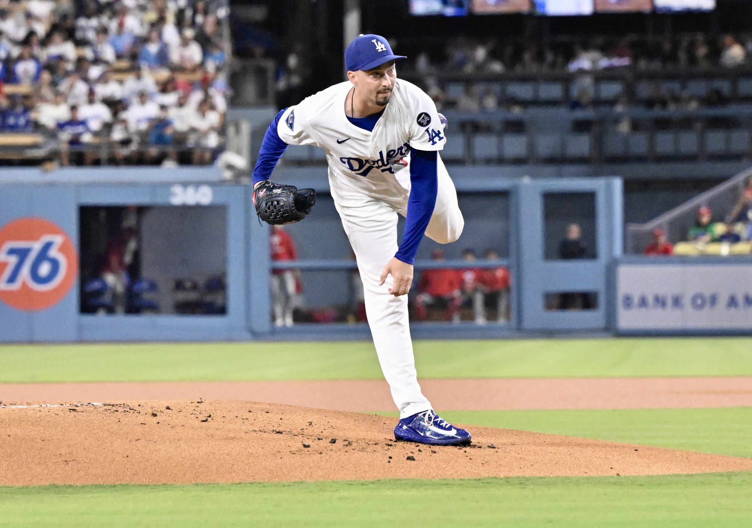 Dodgers starting pitcher Blake Snell throws to the plate during...