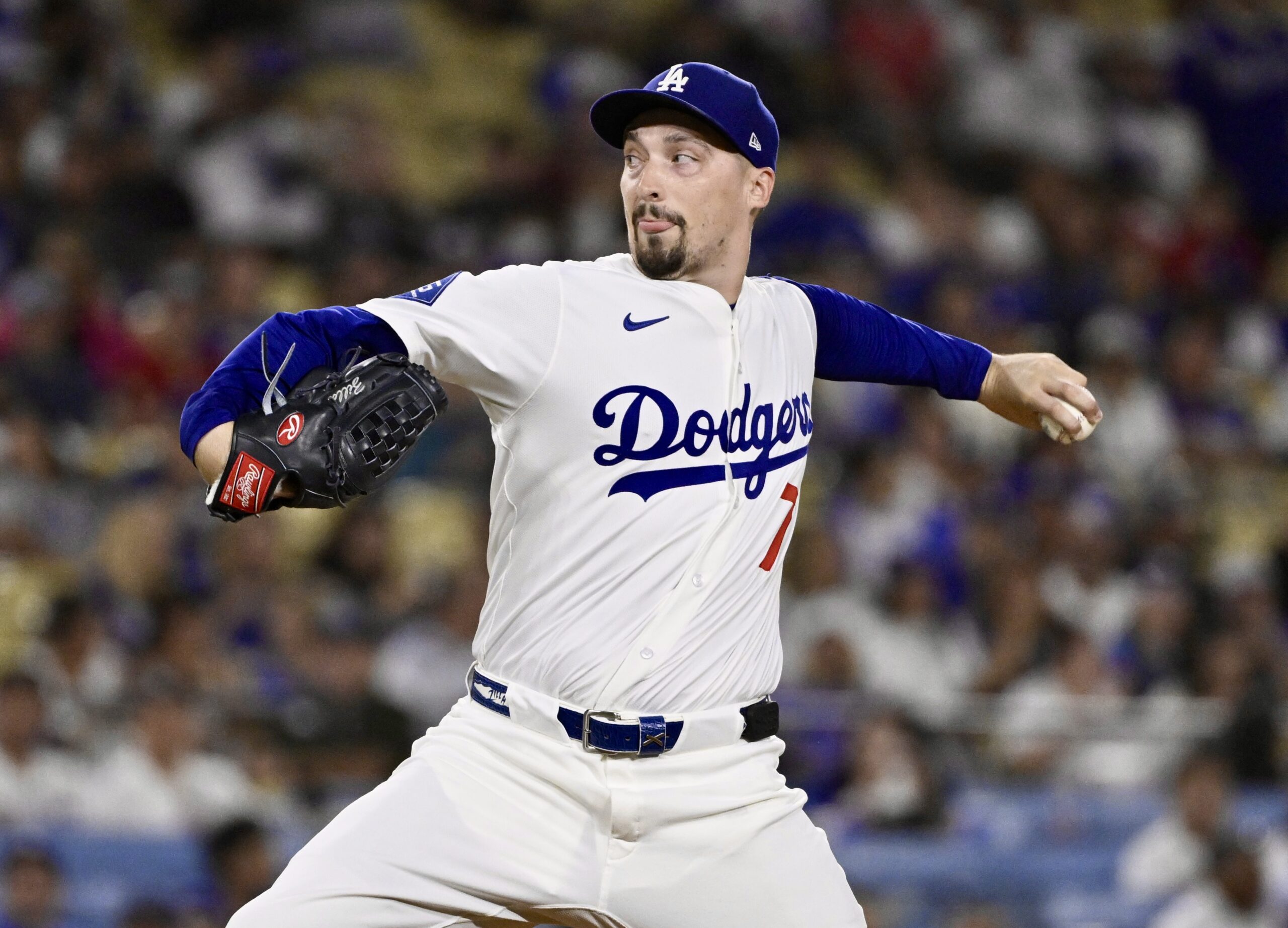 Dodgers starting pitcher Blake Snell throws to the plate during...