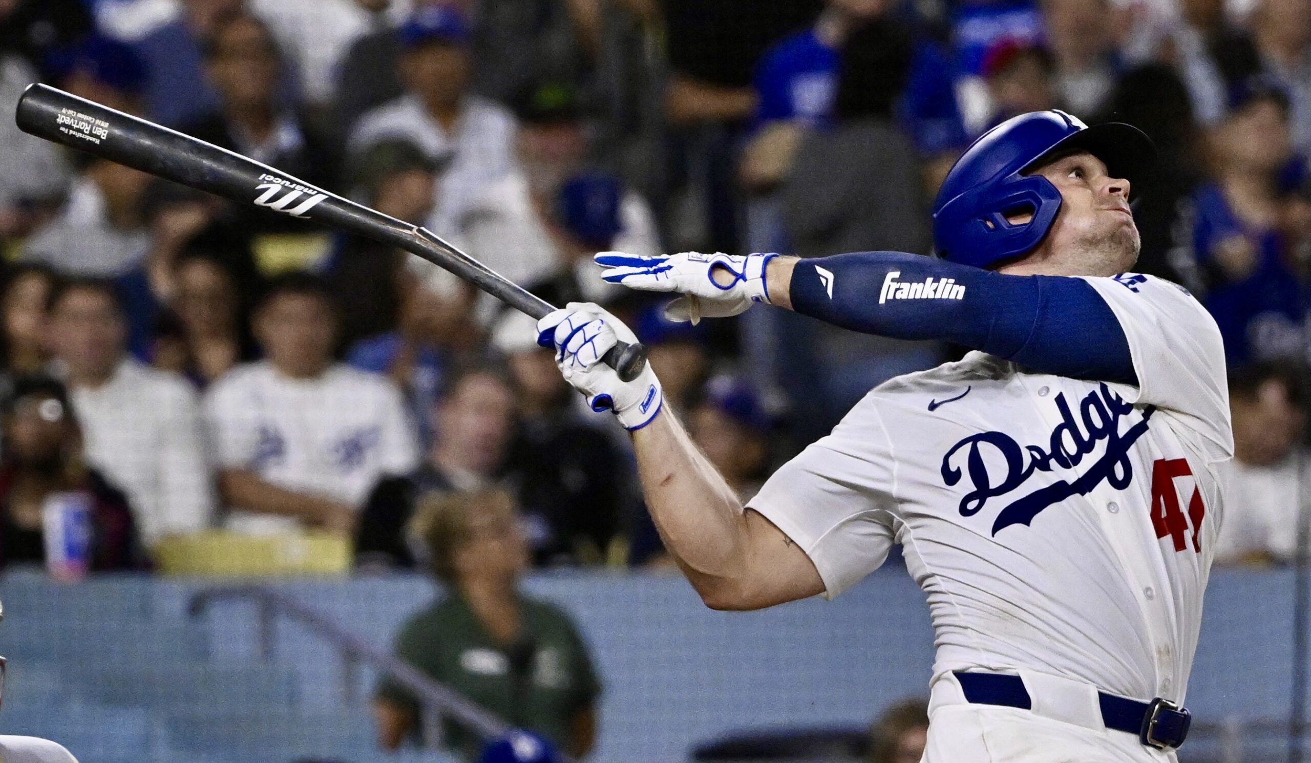 The Dodgers’ Ben Rortvedt breaks his bat while flying out...