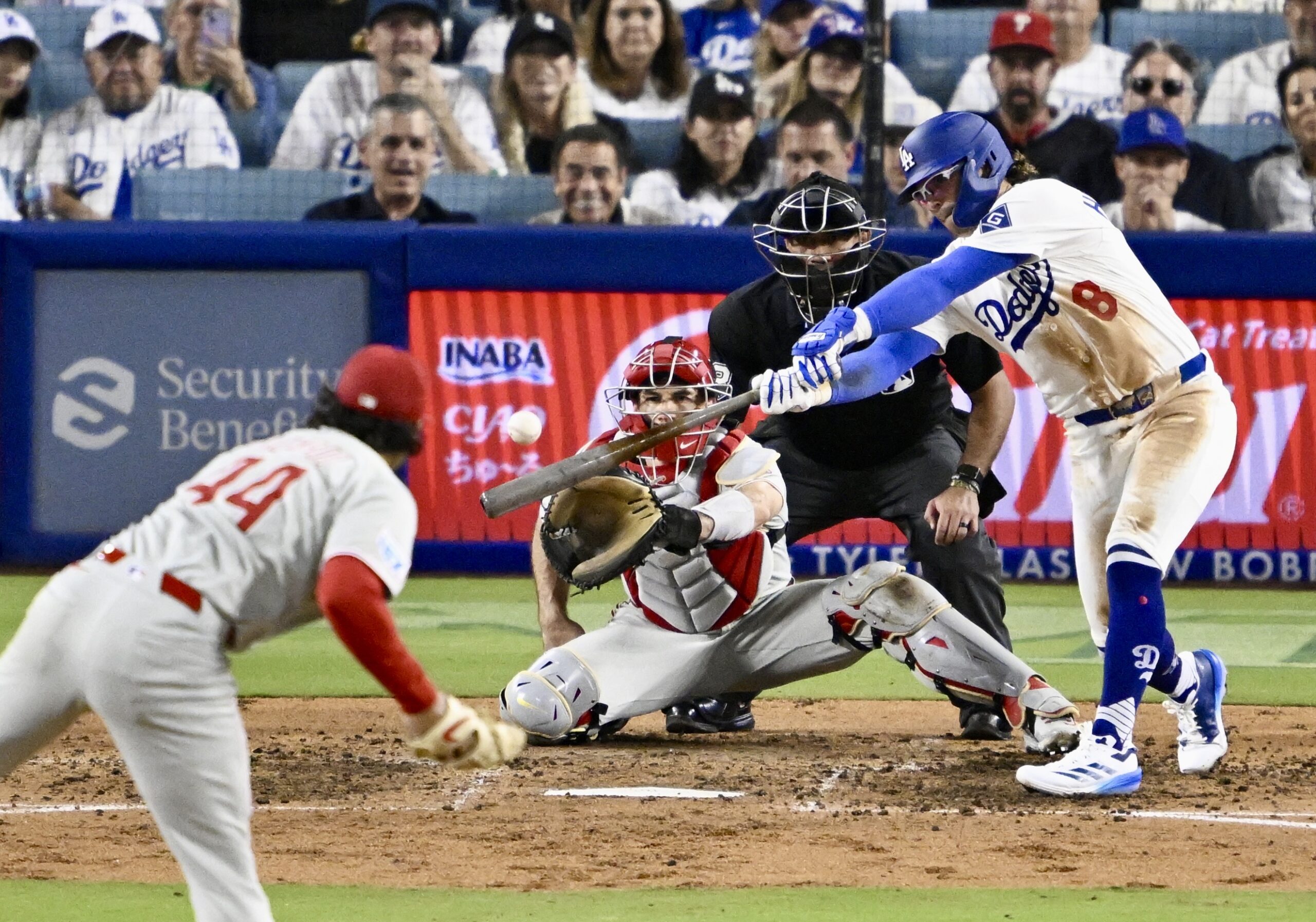 The Dodgers’ Kike Hernandez hits an RBI single to score...