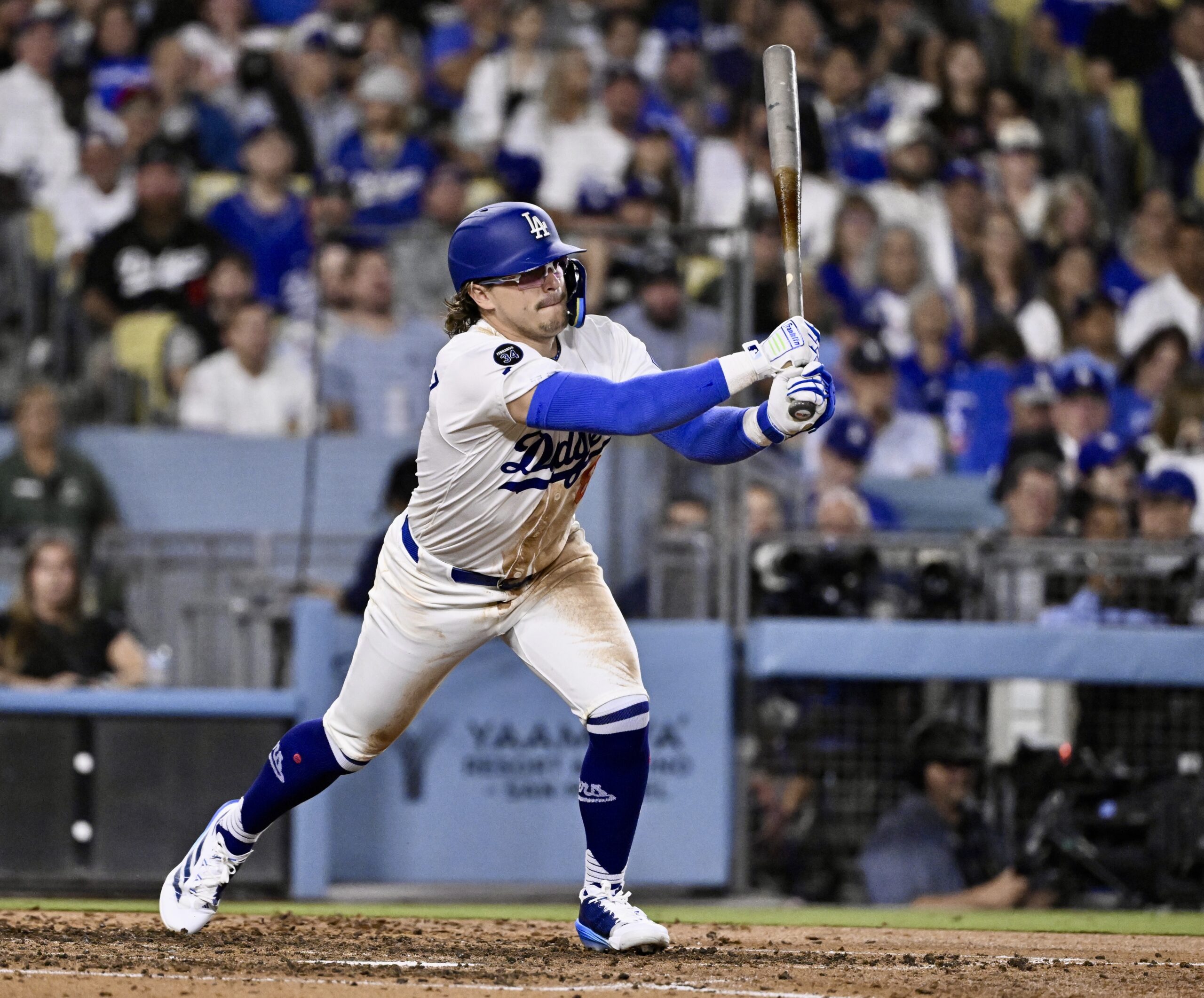 The Dodgers’ Kike Hernandez hits an RBI single to score...