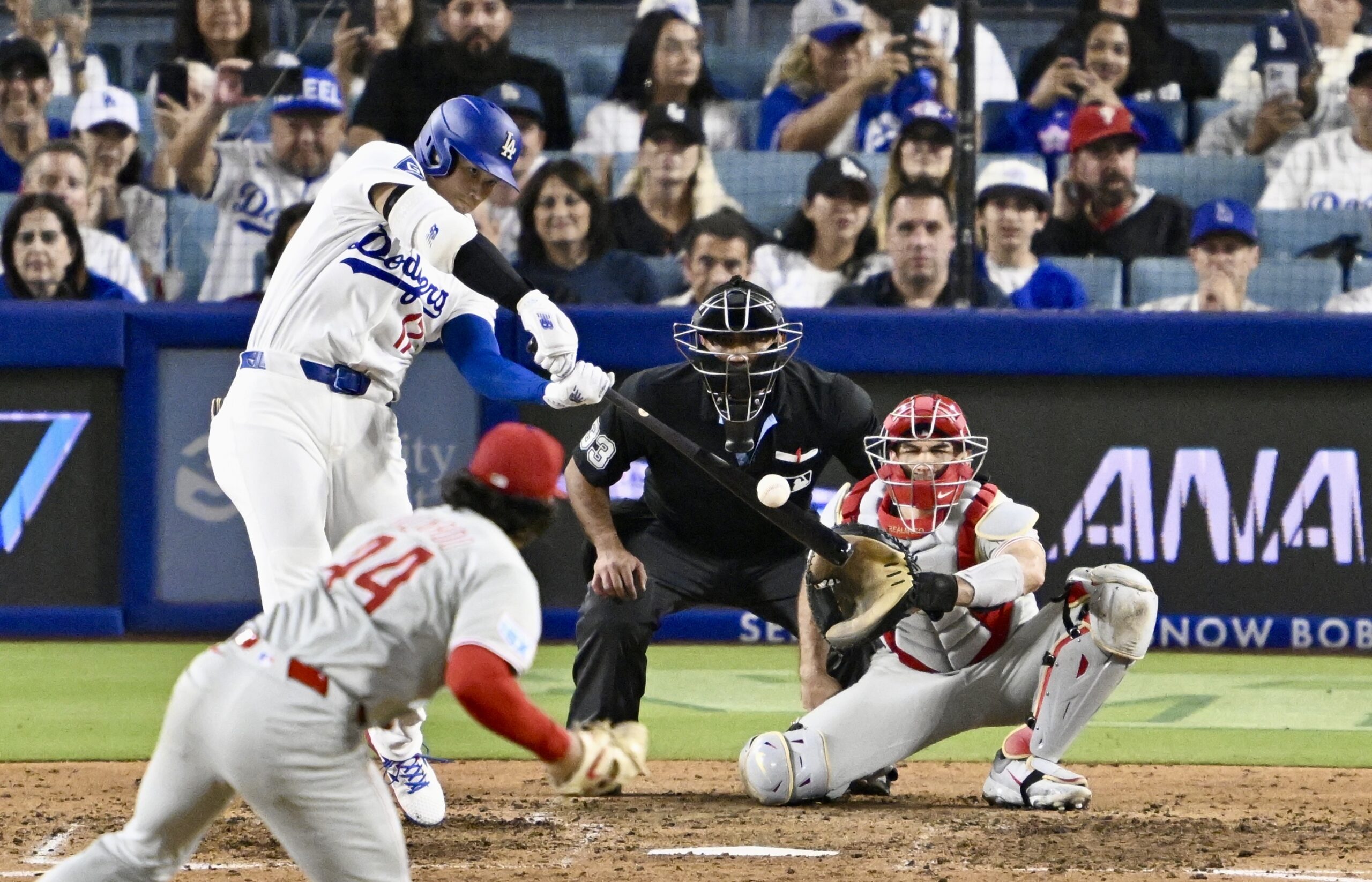 Dodgers star Shohei Ohtani hits a solo home run off...