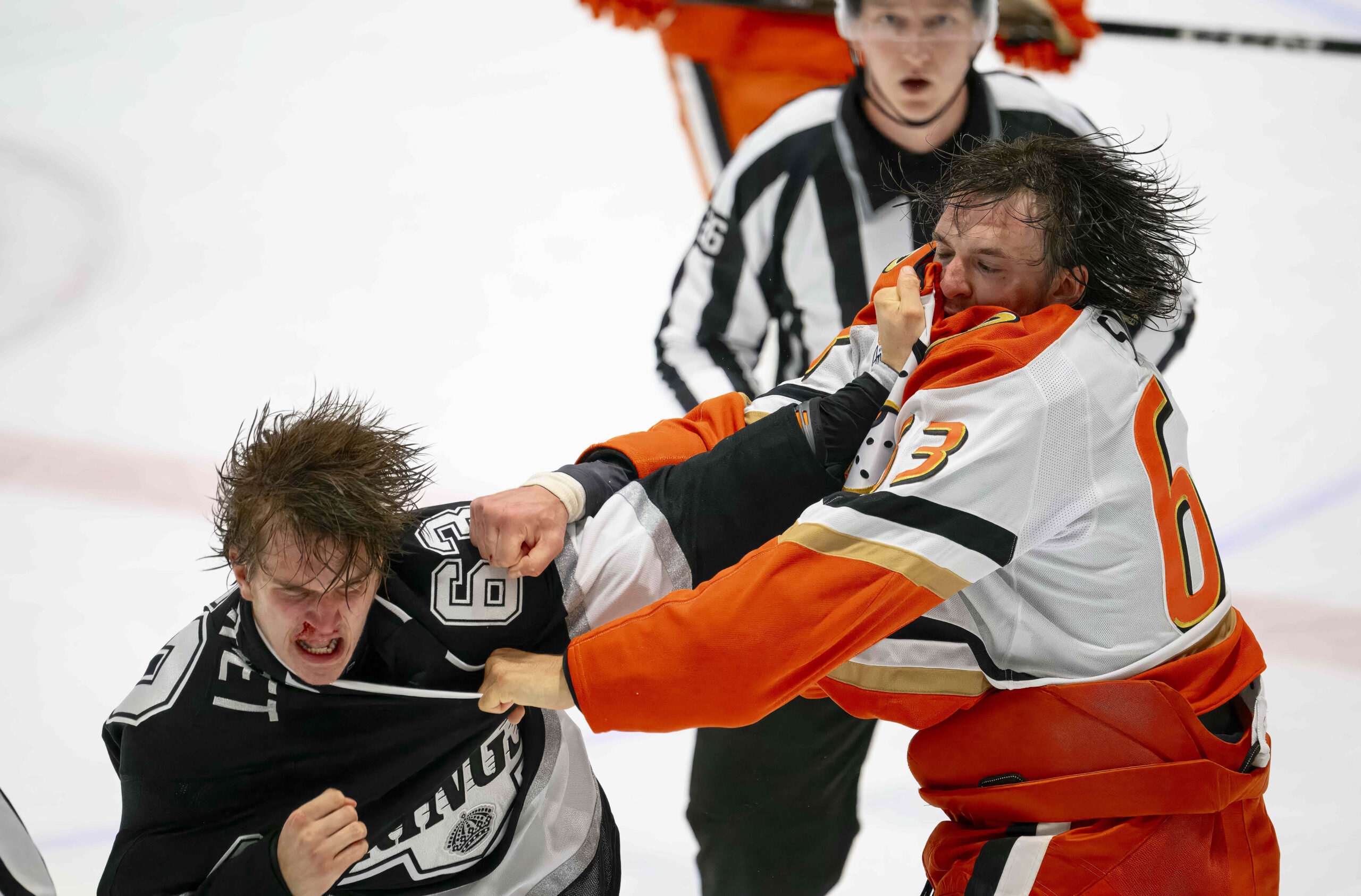 The Duck’s Konnor Smith, right, and the Kings’ Nate Corbet...