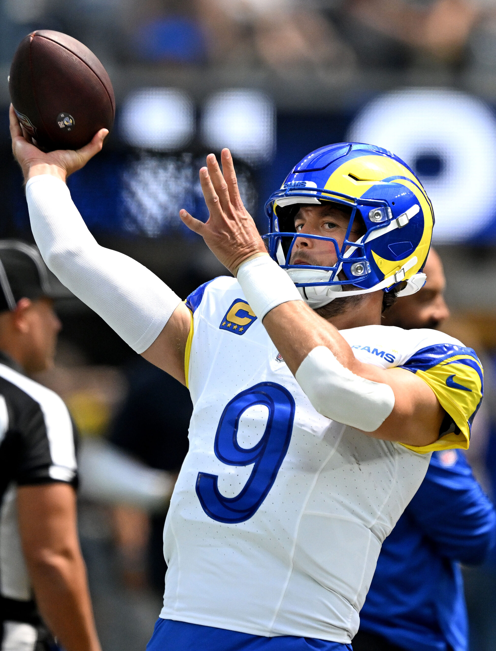 Rams starting quarterback Matthew Stafford warms up prior to playing...
