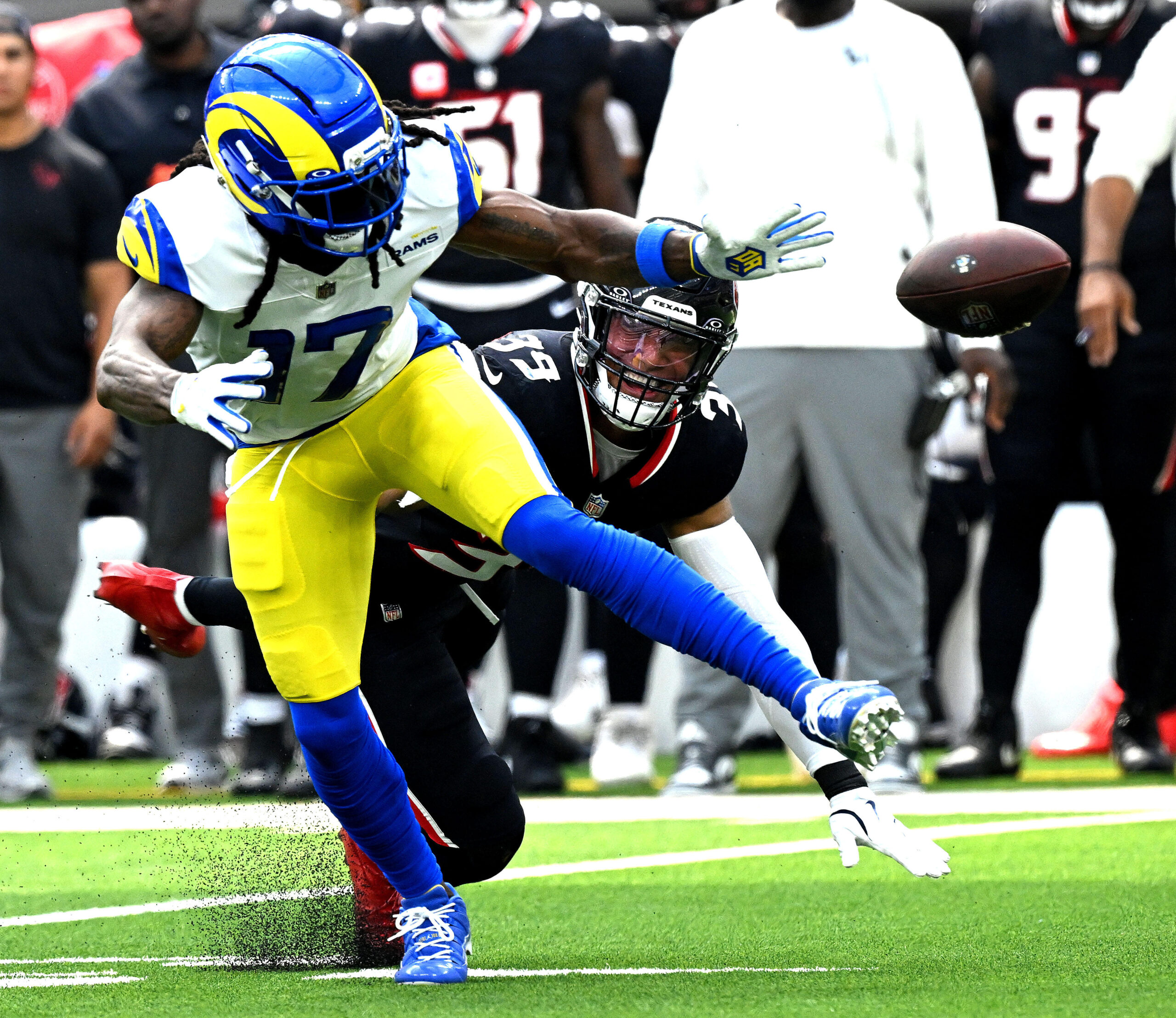 Rams wide receiver Davante Adams has a pass knocked away...