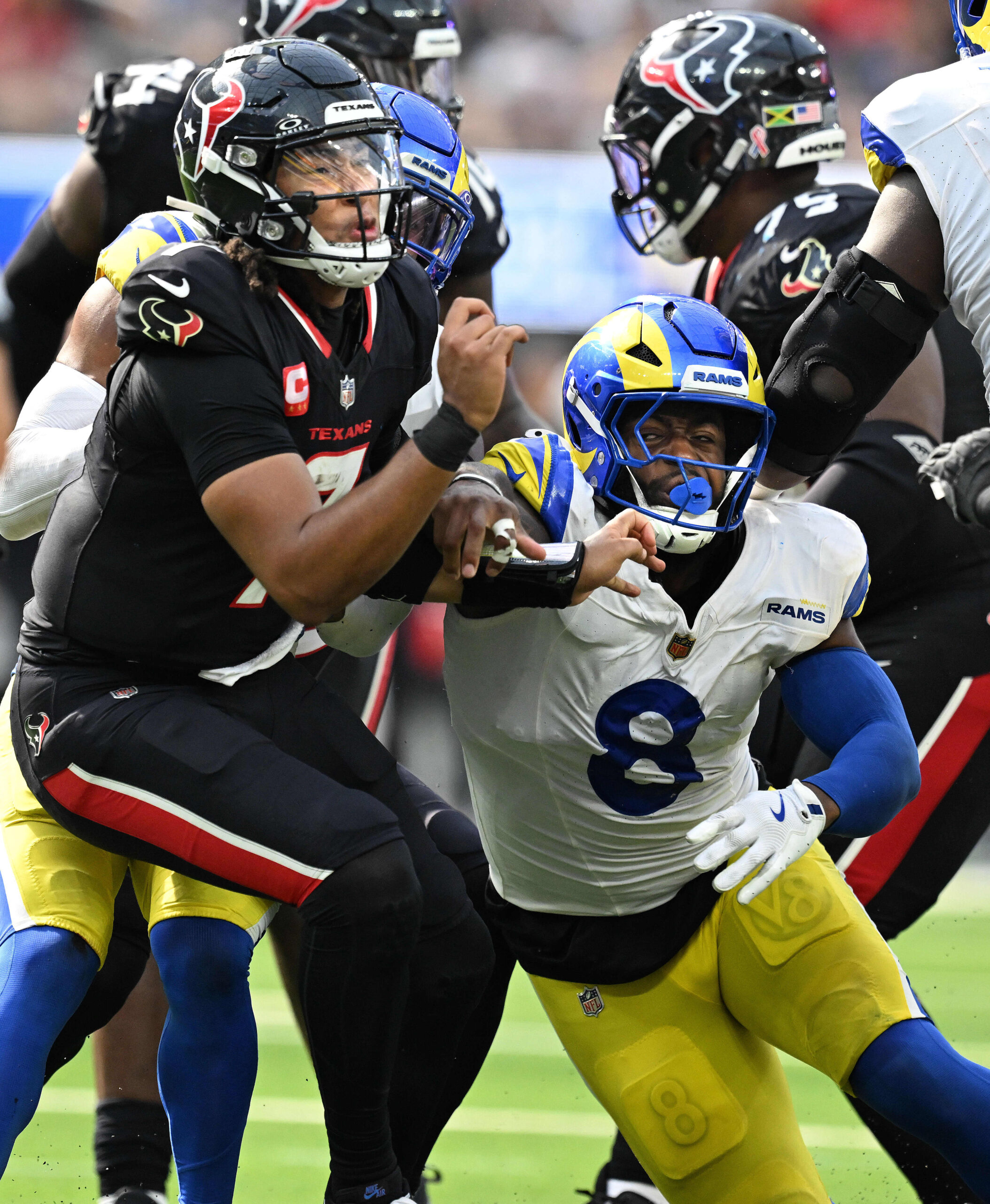 Texans quarterback C.J. Stroud receives an uncalled late hit from...