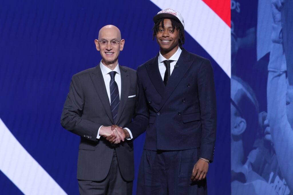 Jun 25, 2025; Brooklyn, NY, USA; Tre Johnson stands with NBA commissioner Adam Silver after being selected as the sixth pick by the Washington Wizards in the first round of the 2025 NBA Draft at Barclays Center. Mandatory Credit: Brad Penner-Imagn Images