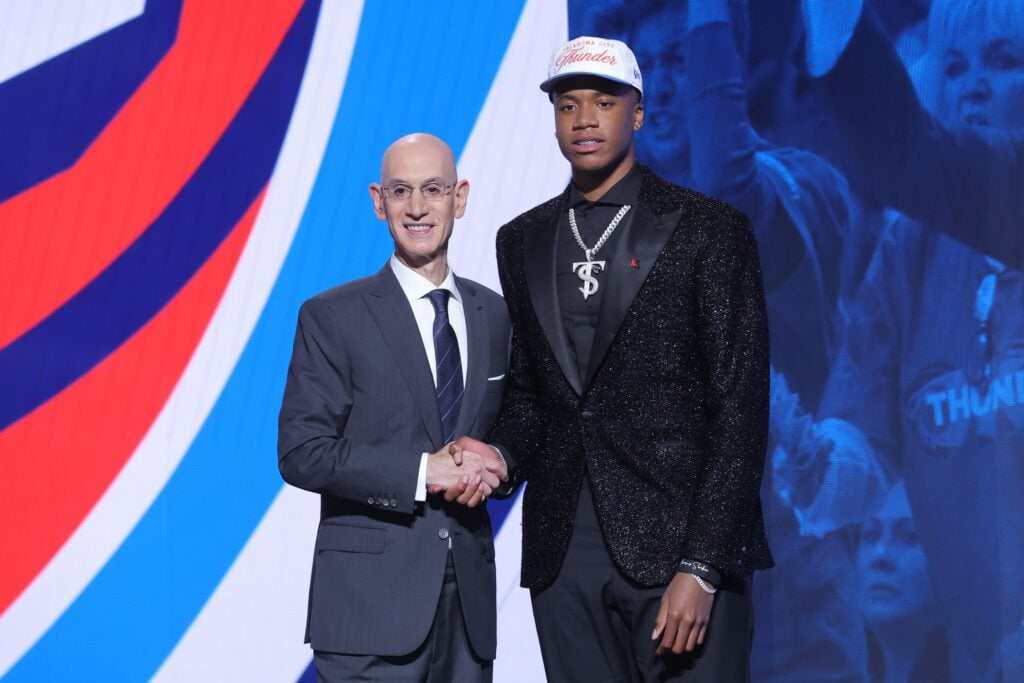 Thomas Sorber stands with NBA commissioner Adam Silver after being selected as the 15th pick by the Oklahoma City Thunder in the first round of the 2025 NBA Draft at Barclays Center.