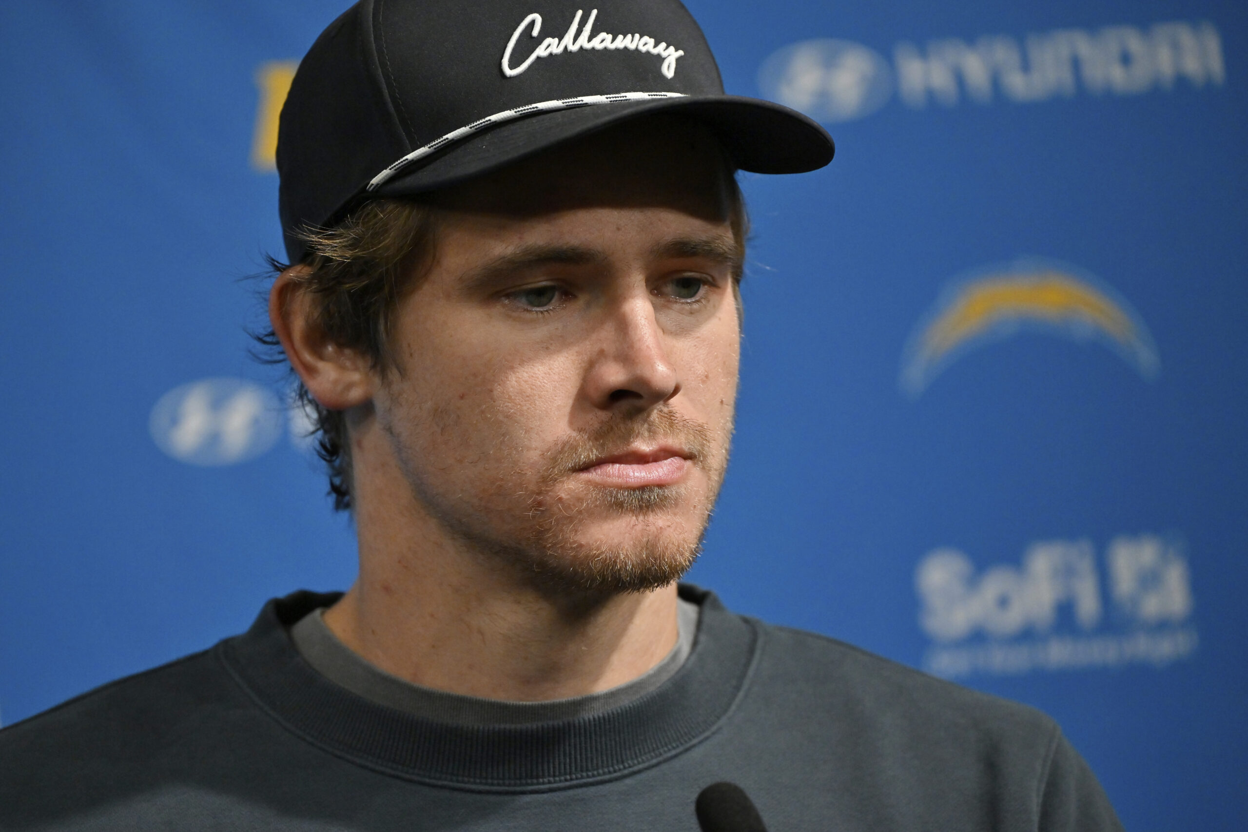 Chargers quarterback Justin Herbert speaks during a news conference after...