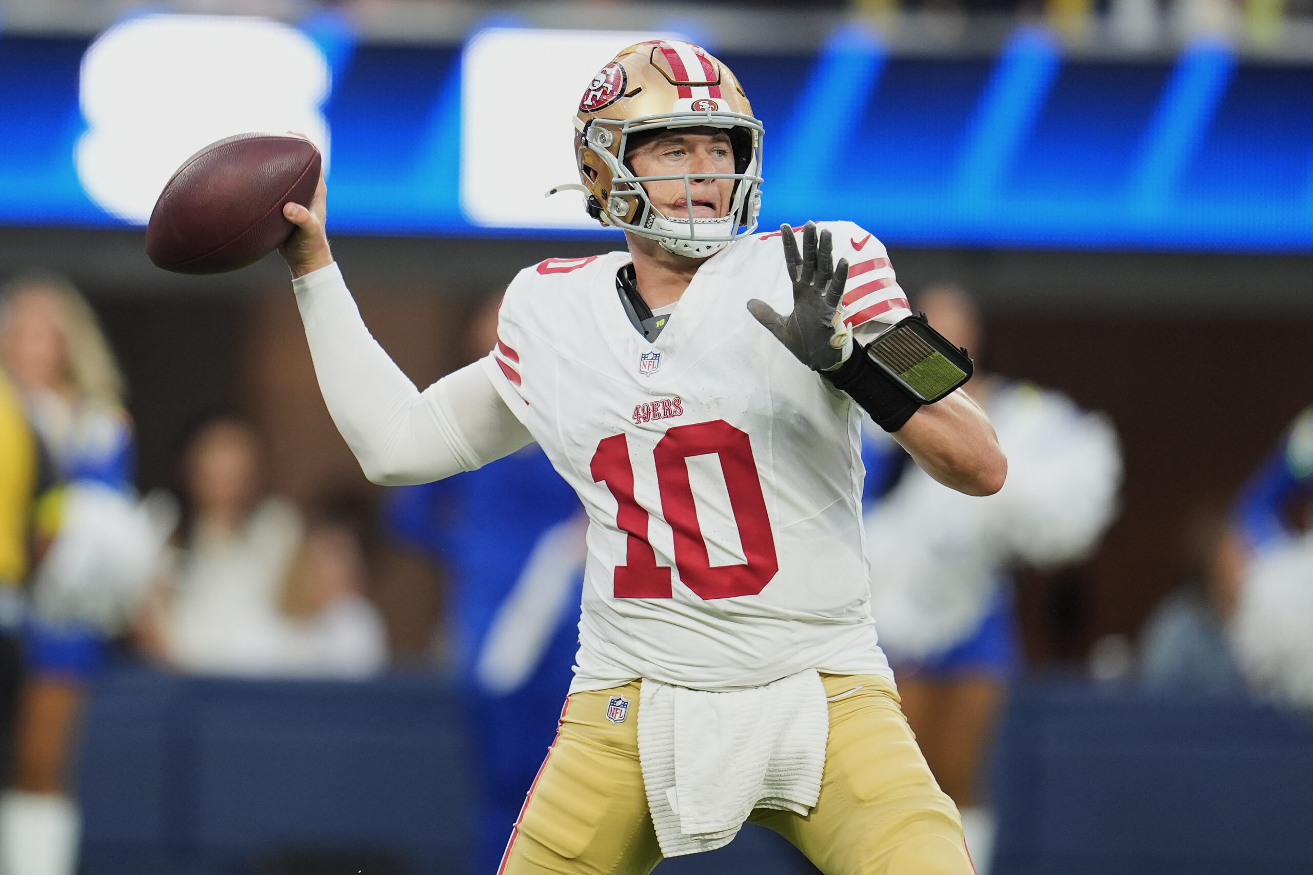 San Francisco 49ers quarterback Mac Jones passes against the Rams...