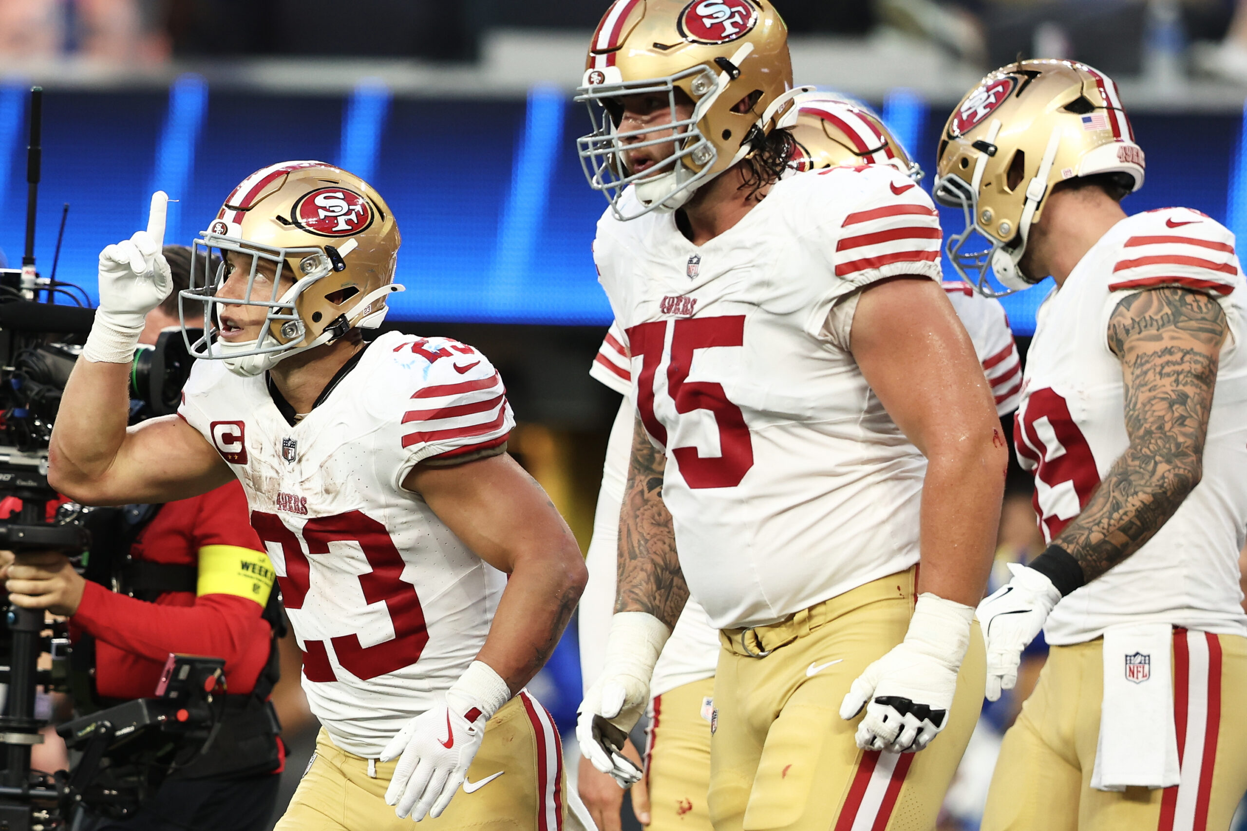 San Francisco 49ers running back Christian McCaffrey (23) celebrates with...