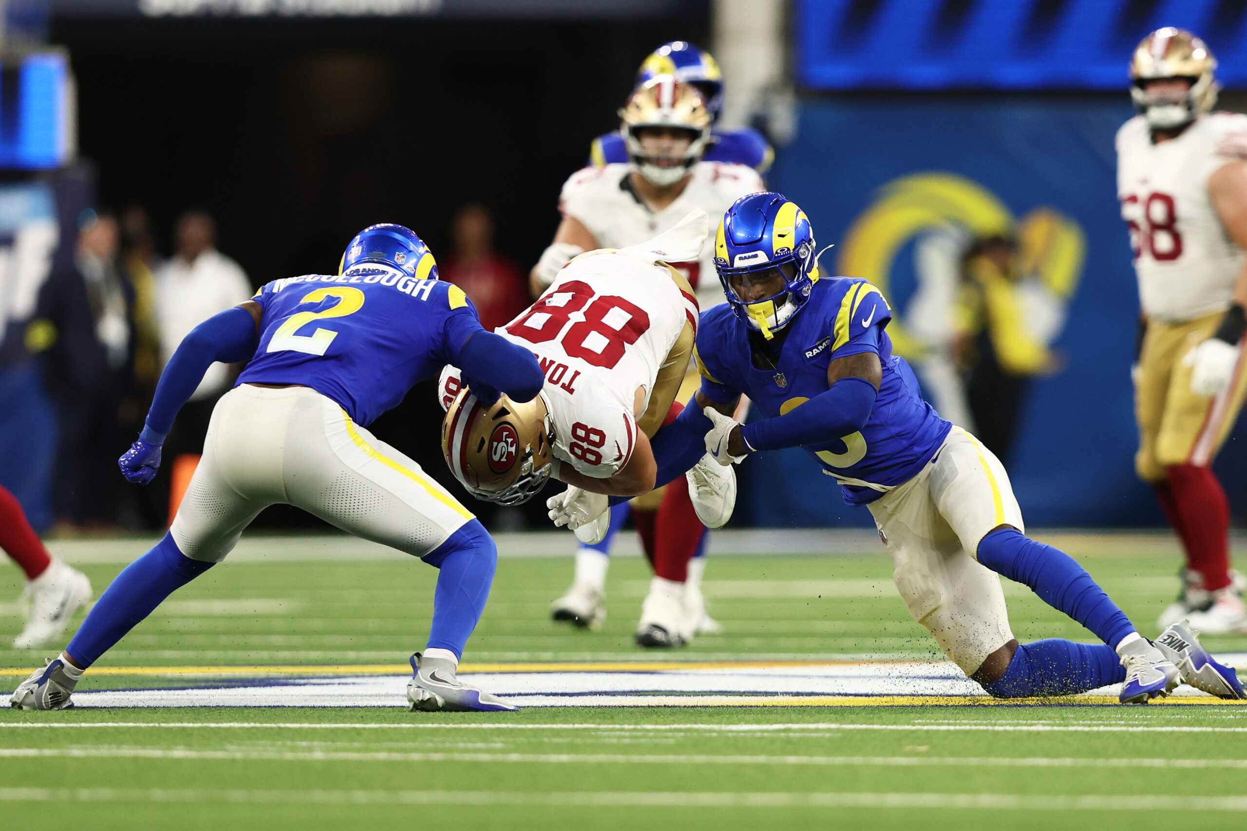 San Francisco 49ers tight end Jake Tonges (88) is tackled...