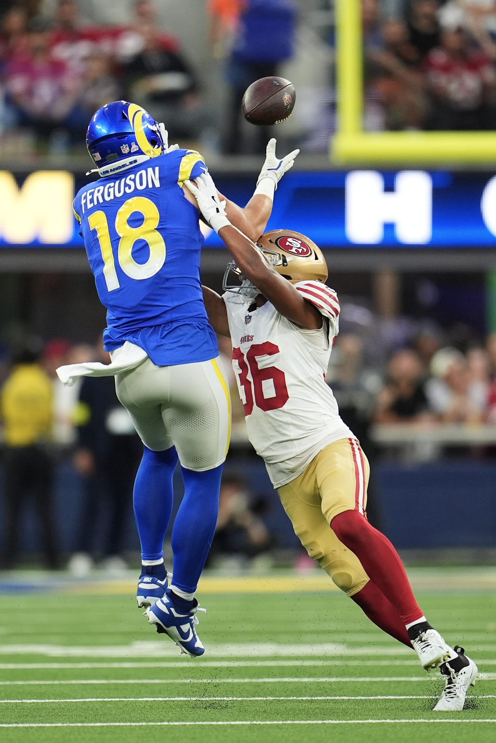 Rams tight end Terrance Ferguson (18) catches a pass over...