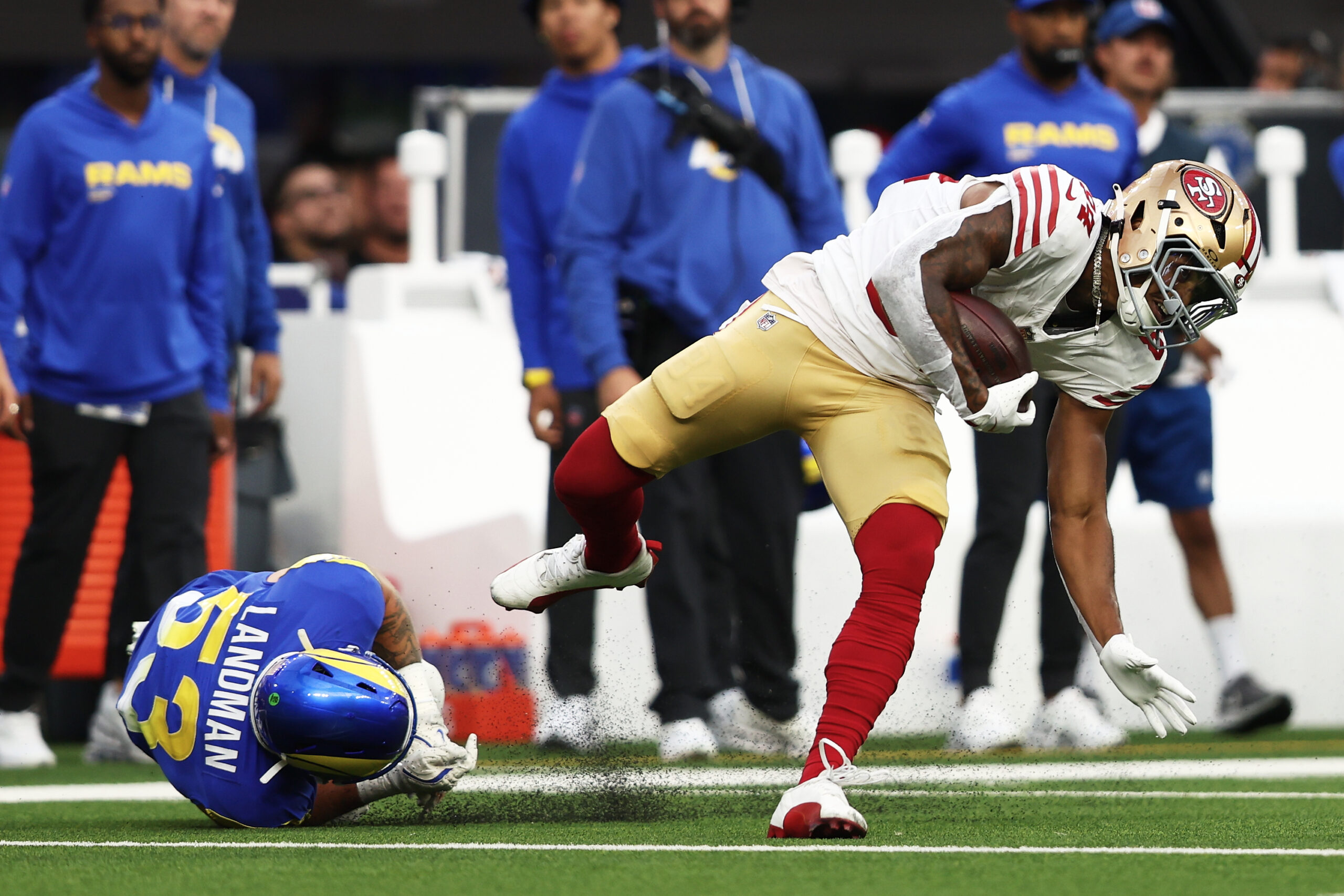 San Francisco 49ers wide receiver Kendrick Bourne, right, runs against...