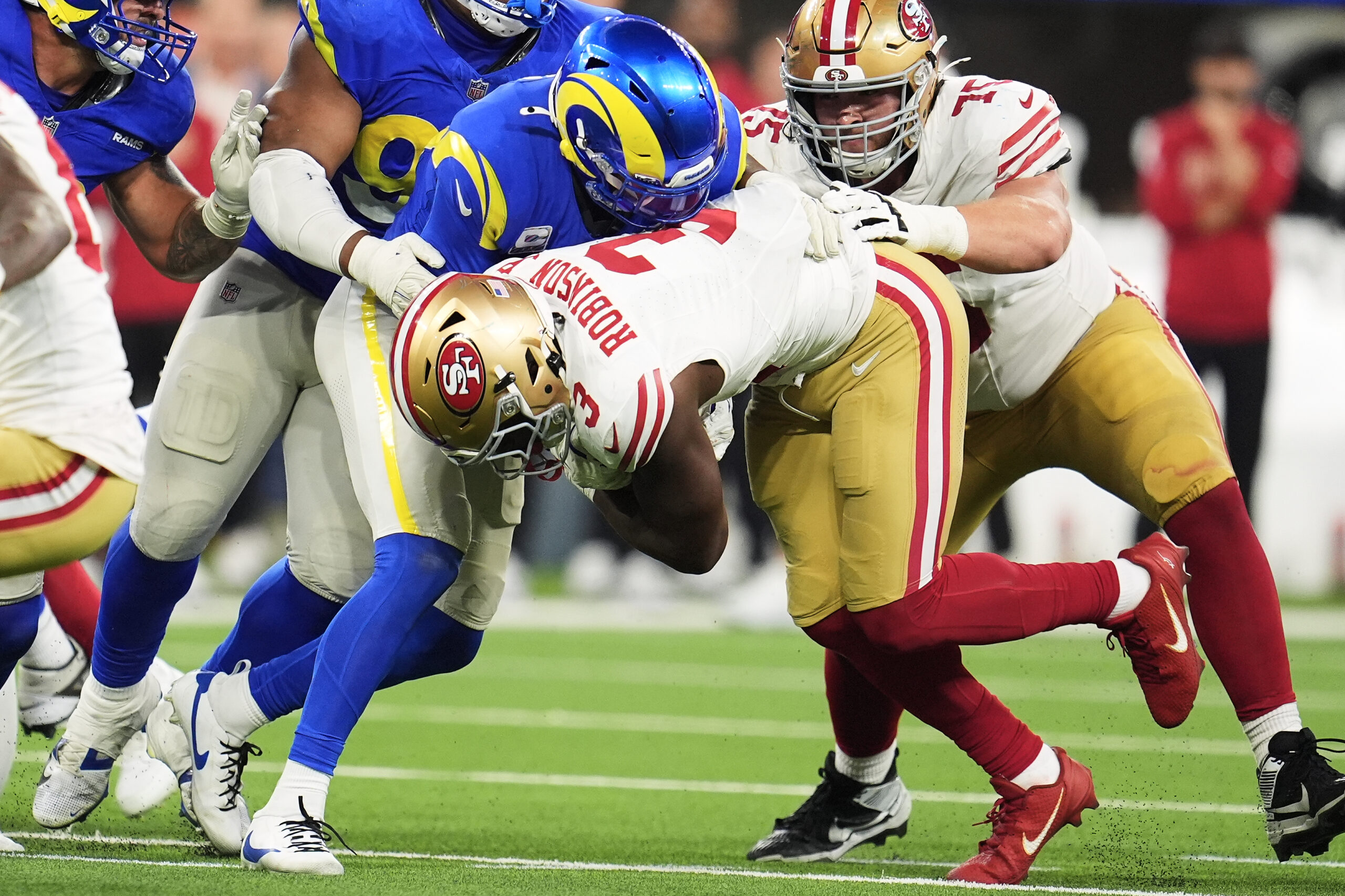 San Francisco 49ers running back Brian Robinson Jr. (3) is...