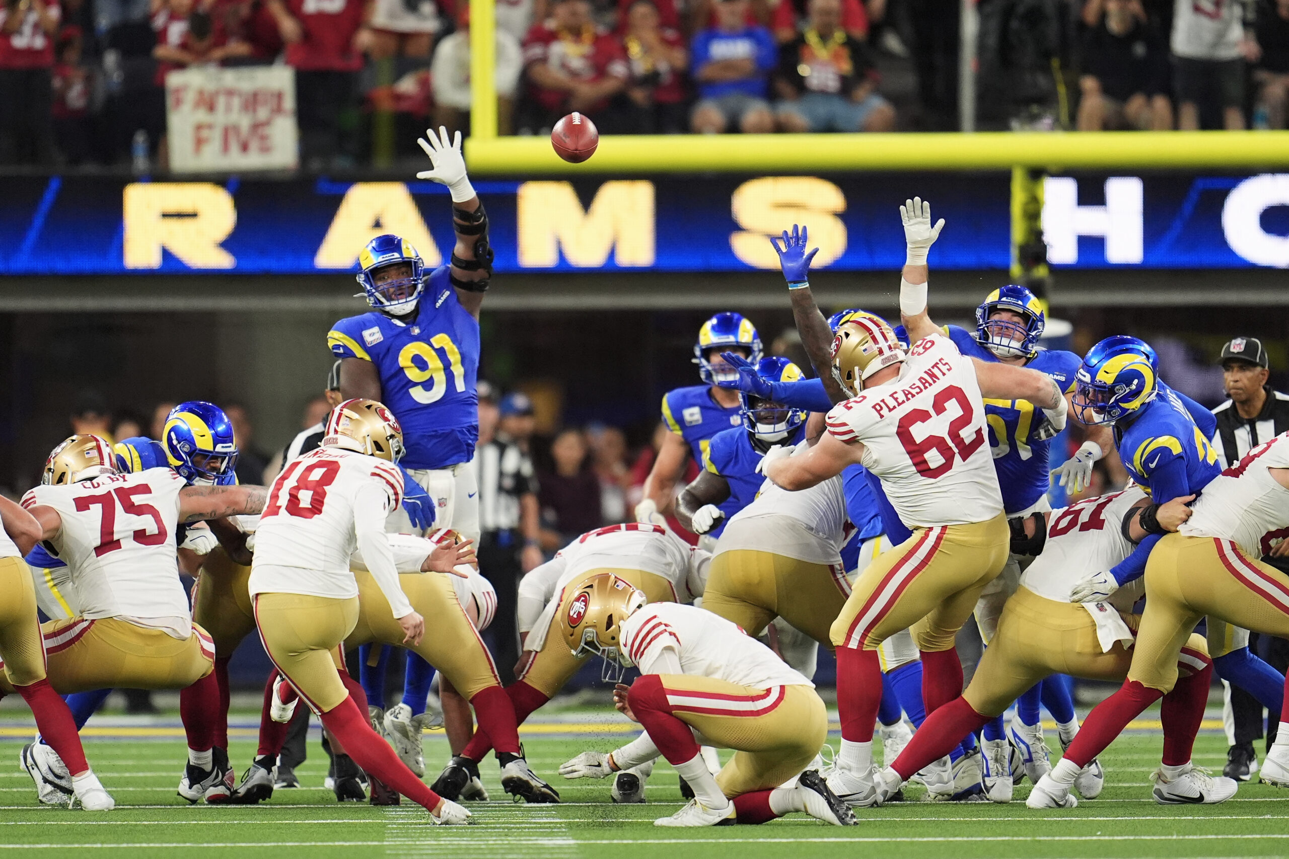 San Francisco 49ers kicker Eddy Piñeiro (18) kicks a field...