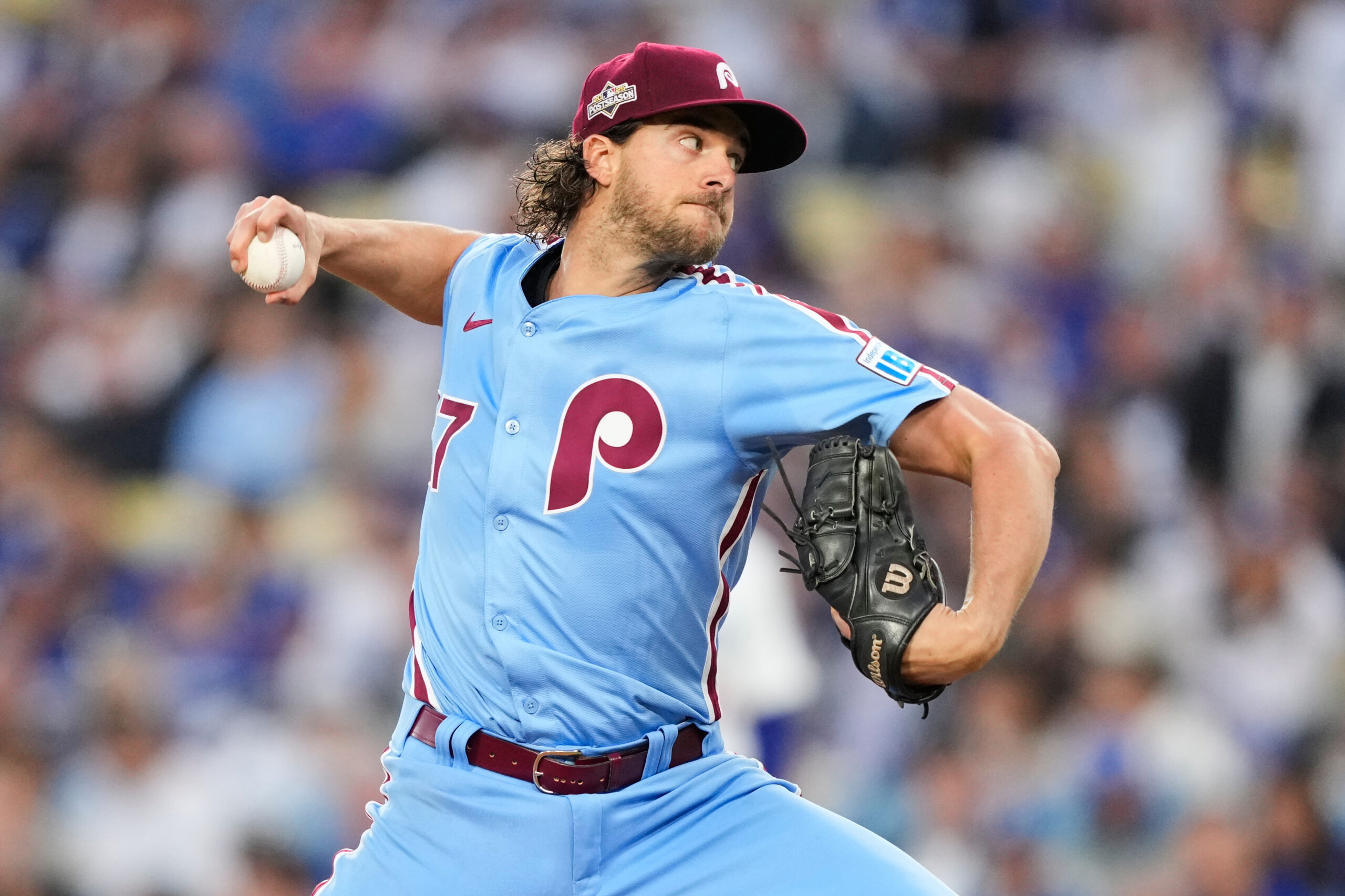 Philadelphia Phillies starting pitcher Aaron Nola throws to a Dodgers...