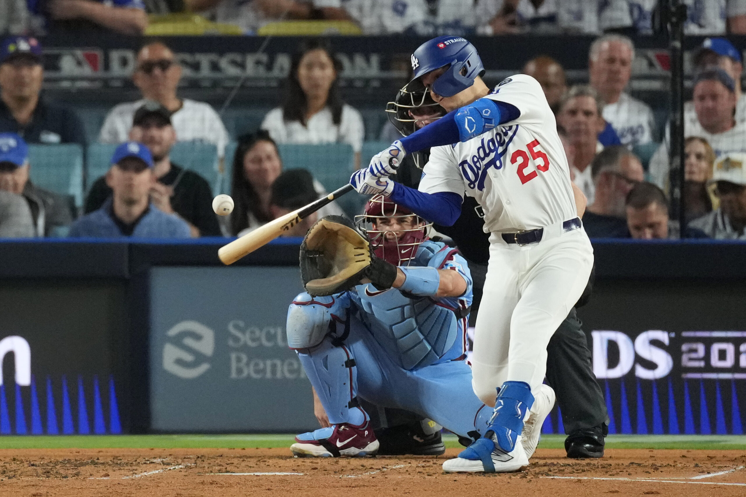 The Dodgers’ Tommy Edman connects for a solo home run...