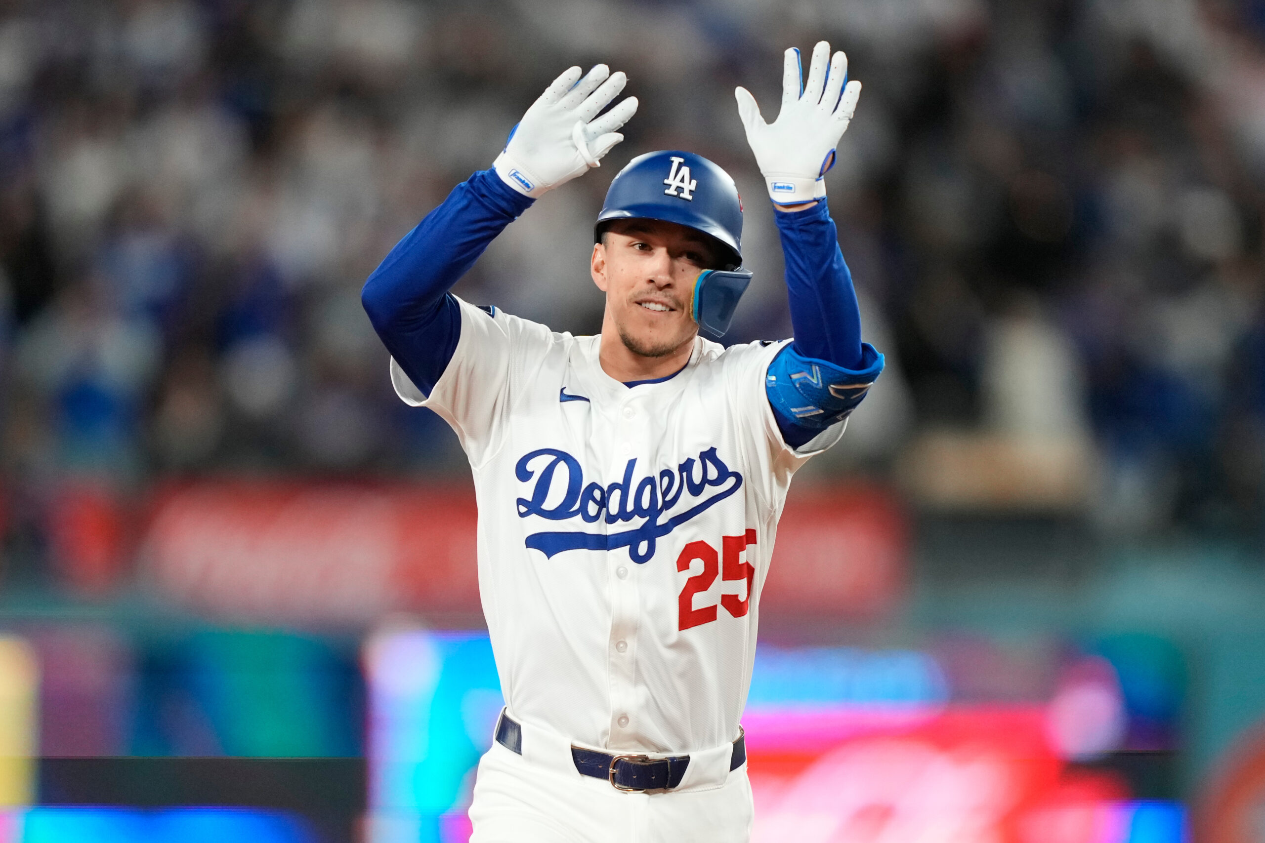 The Dodgers’ Tommy Edman celebrates his solo home during the...
