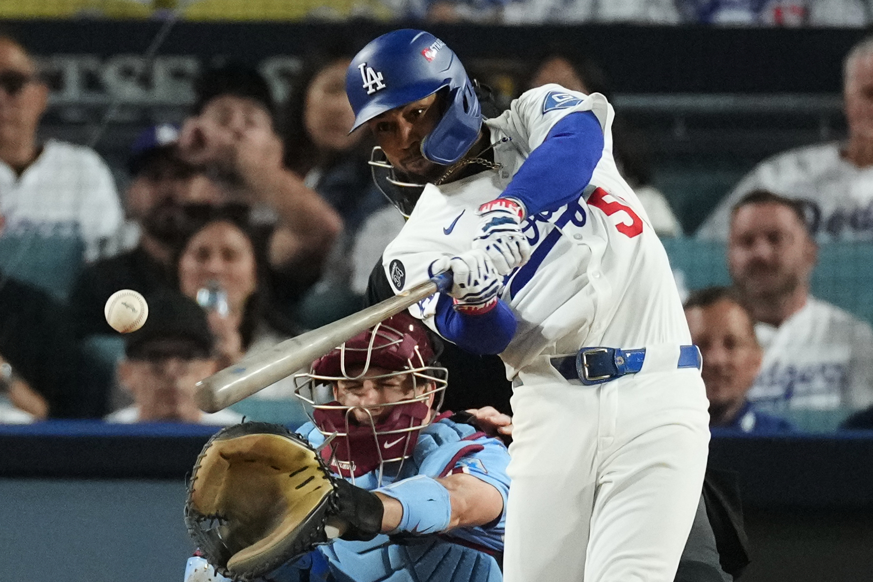 The Dodgers’ Mookie Betts singles during the fifth inning in...