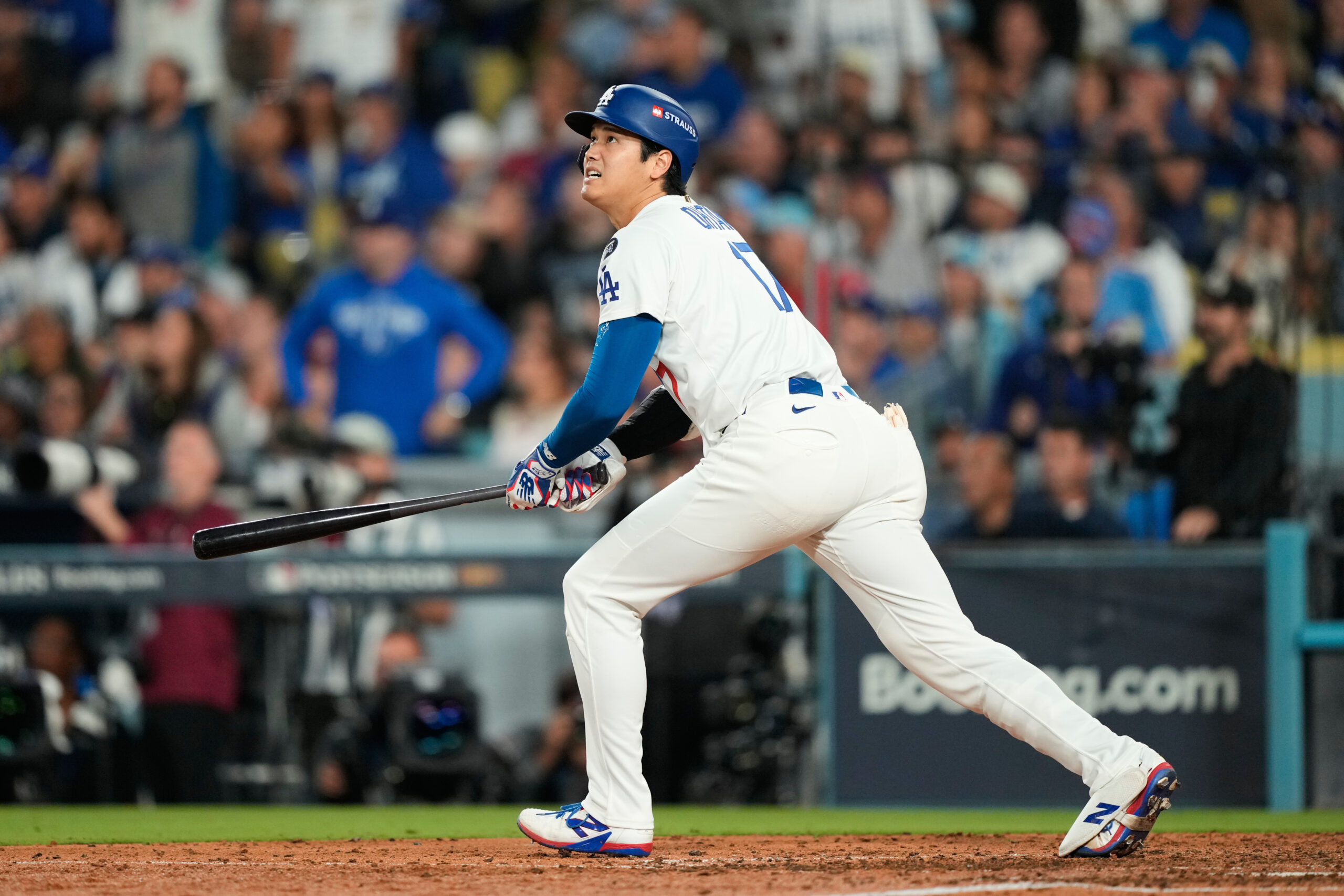 Dodgers star Shohei Ohtani flies out during the seventh inning...