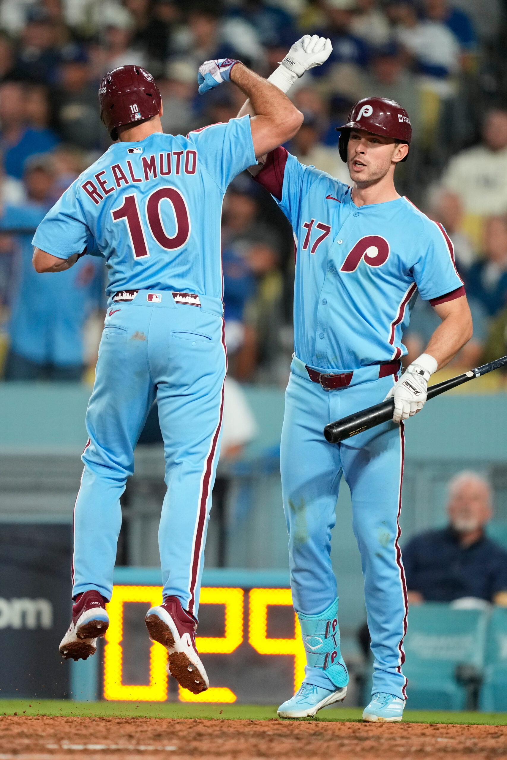 The Philadelphia Phillies’ J.T. Realmuto celebrates his solo home run...