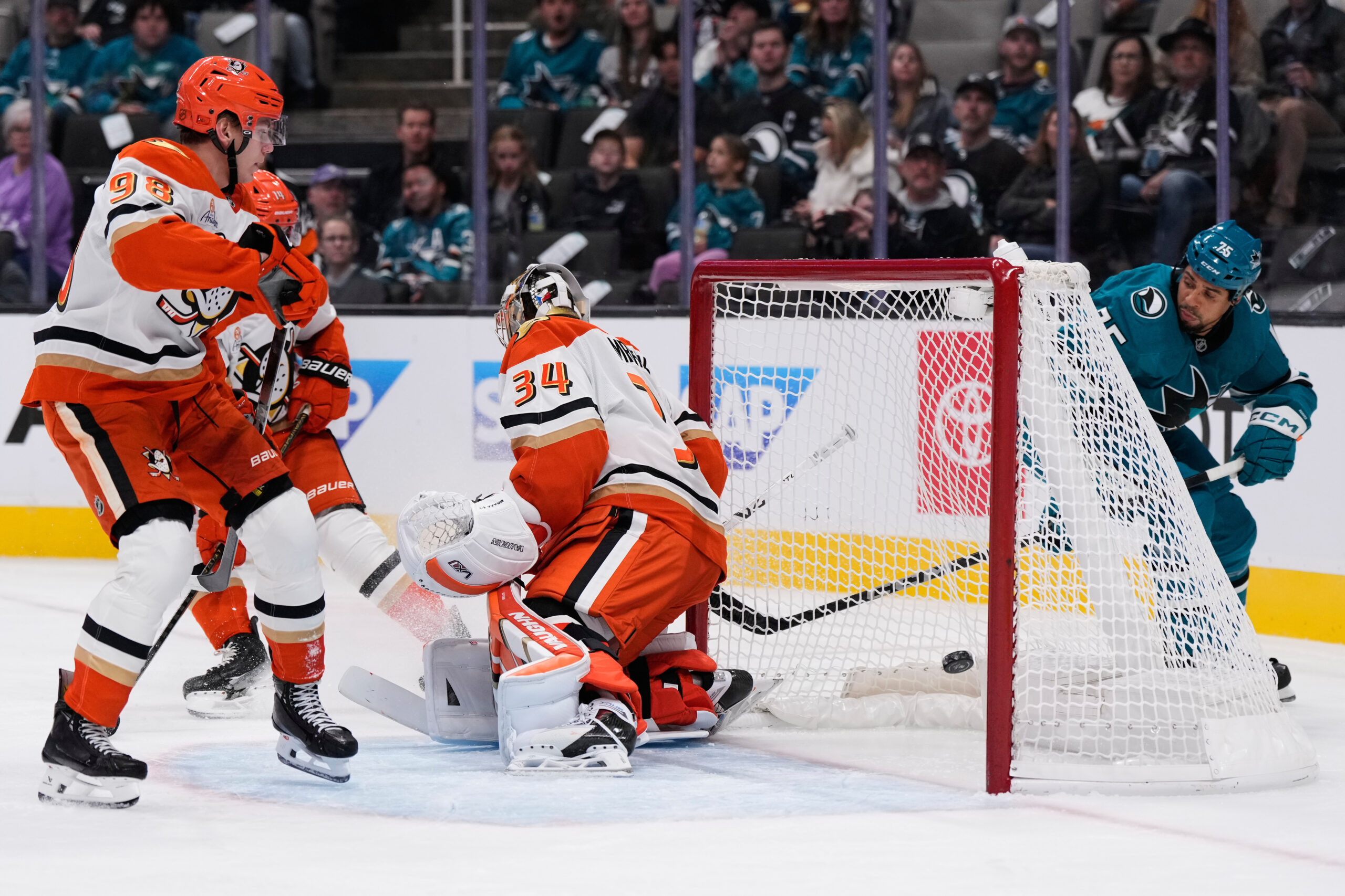 San Jose Sharks right wing Ryan Reaves, right, watches his...