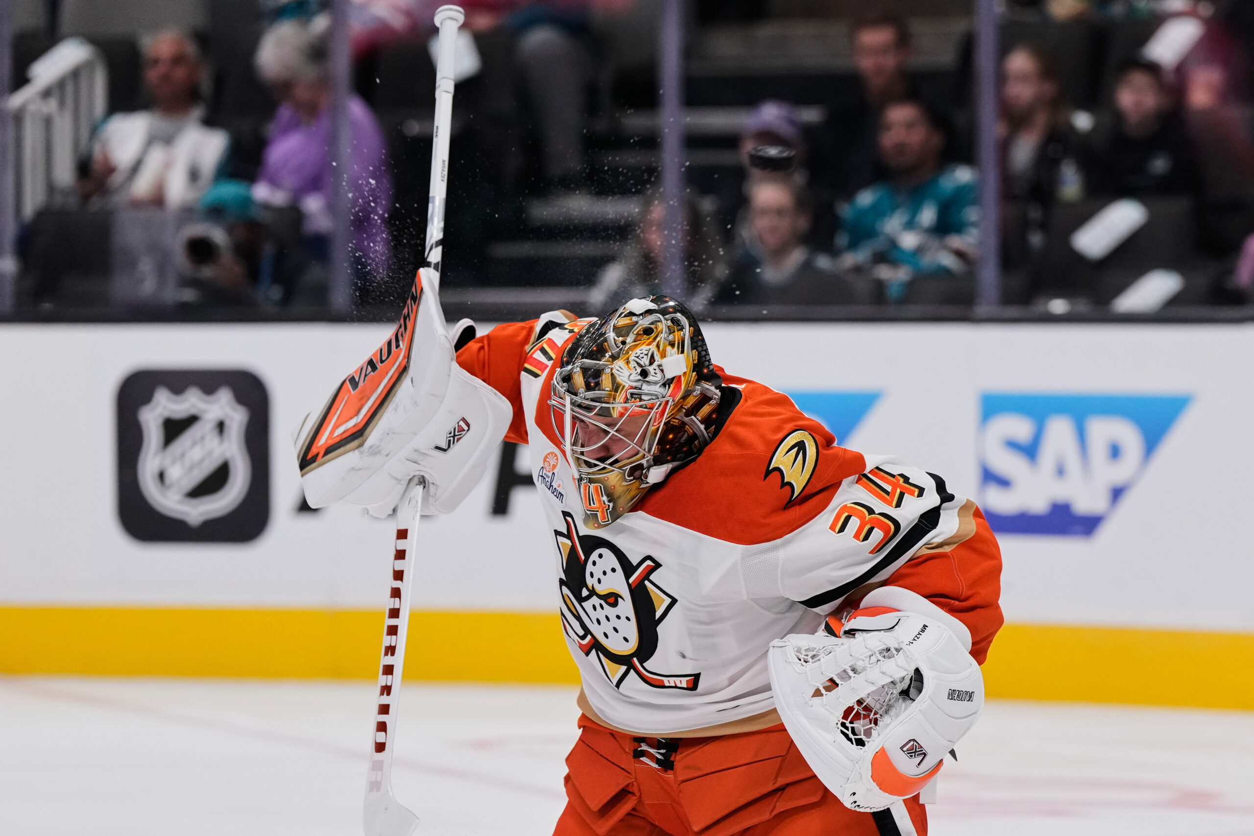 Ducks goaltender Petr Mrazek (34) deflects a shot during the...