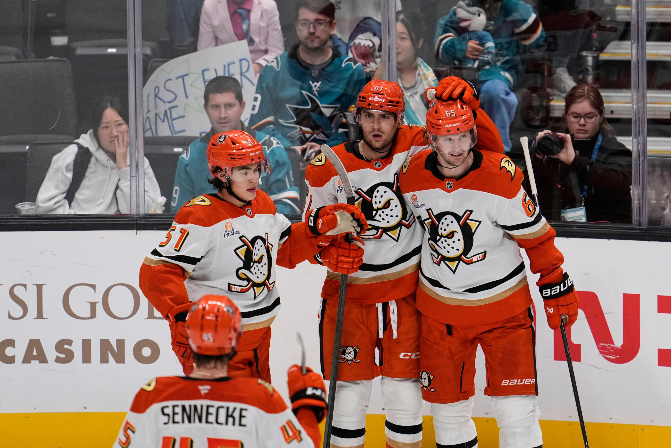 Ducks left wing Cutter Gauthier (61) celebrates with teammates after...