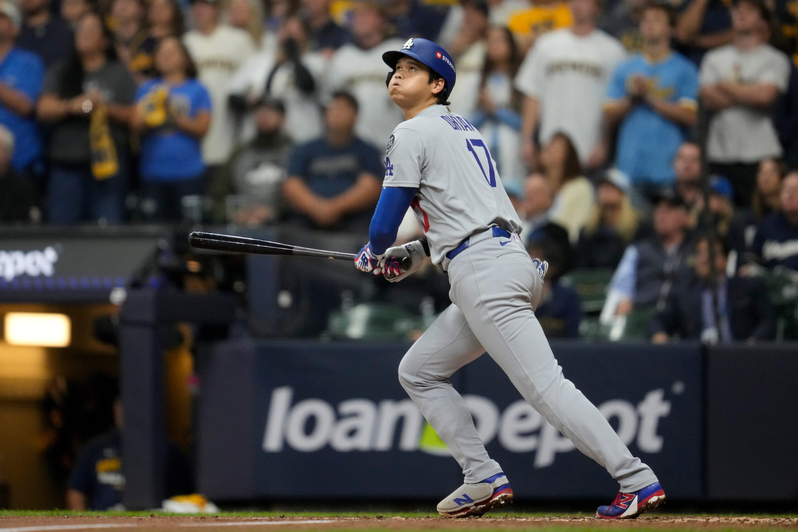 Dodgers star Shohei Ohtani flies out against the Milwaukee Brewers...
