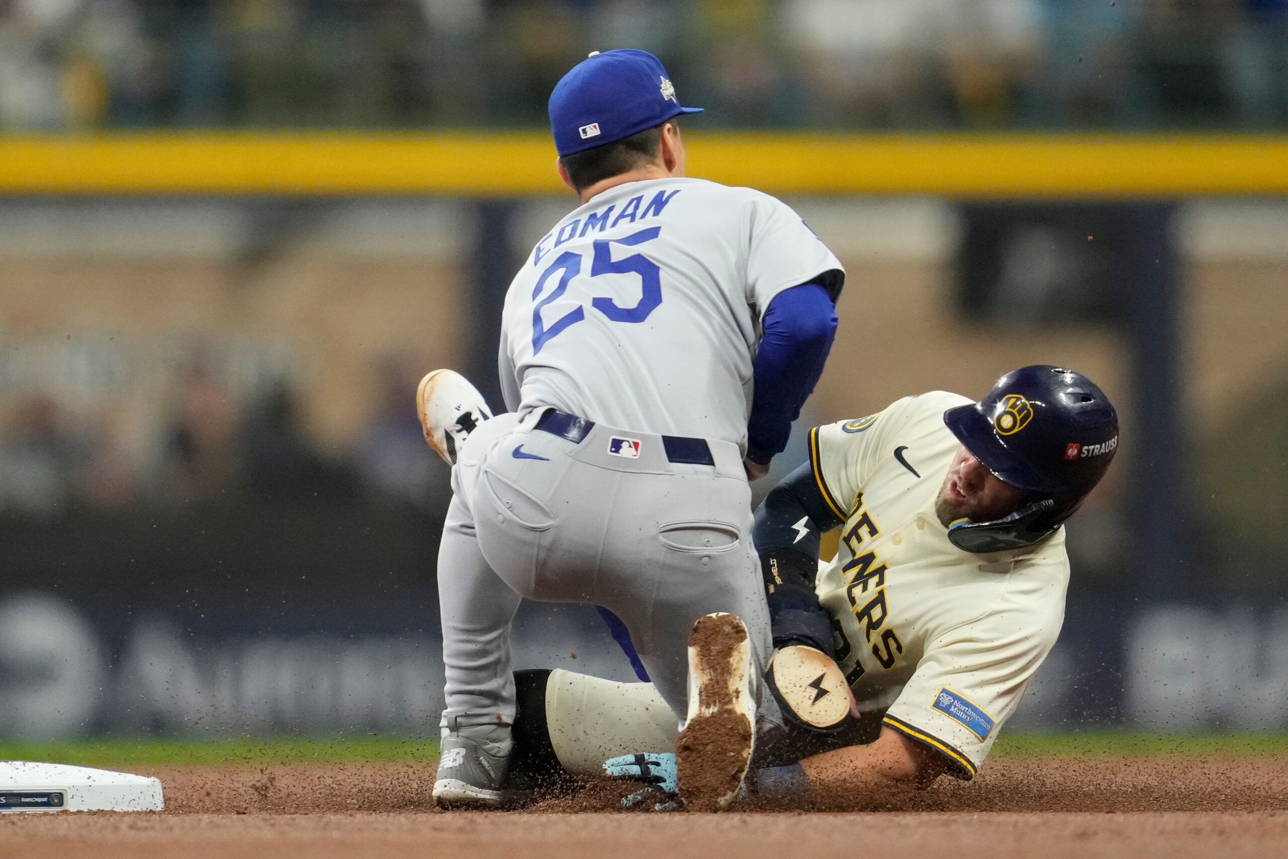 The Milwaukee Brewers’ Caleb Durbin is picked off trying to...